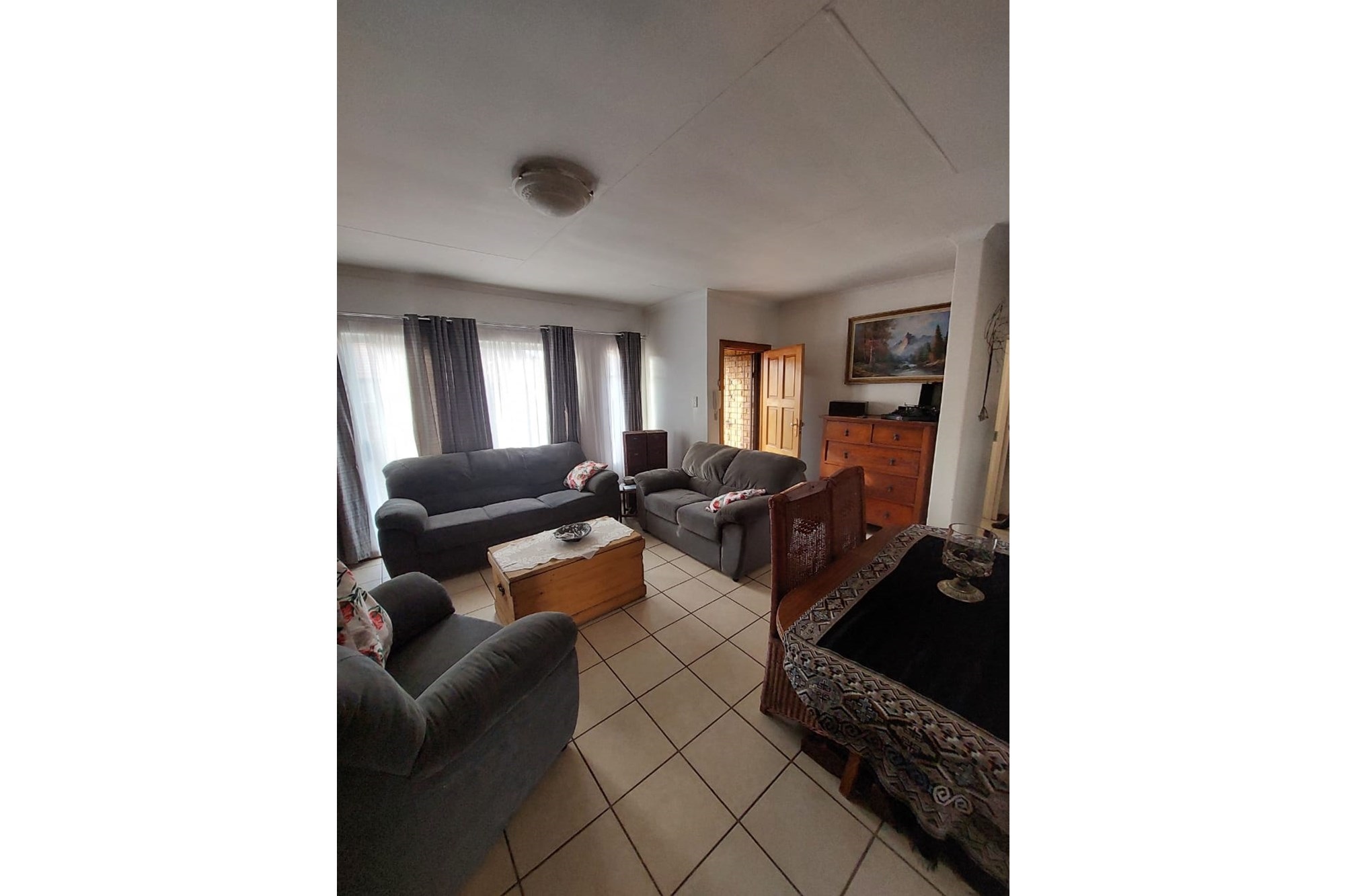 Charming Two-Bedroom Townhouse in Established Area