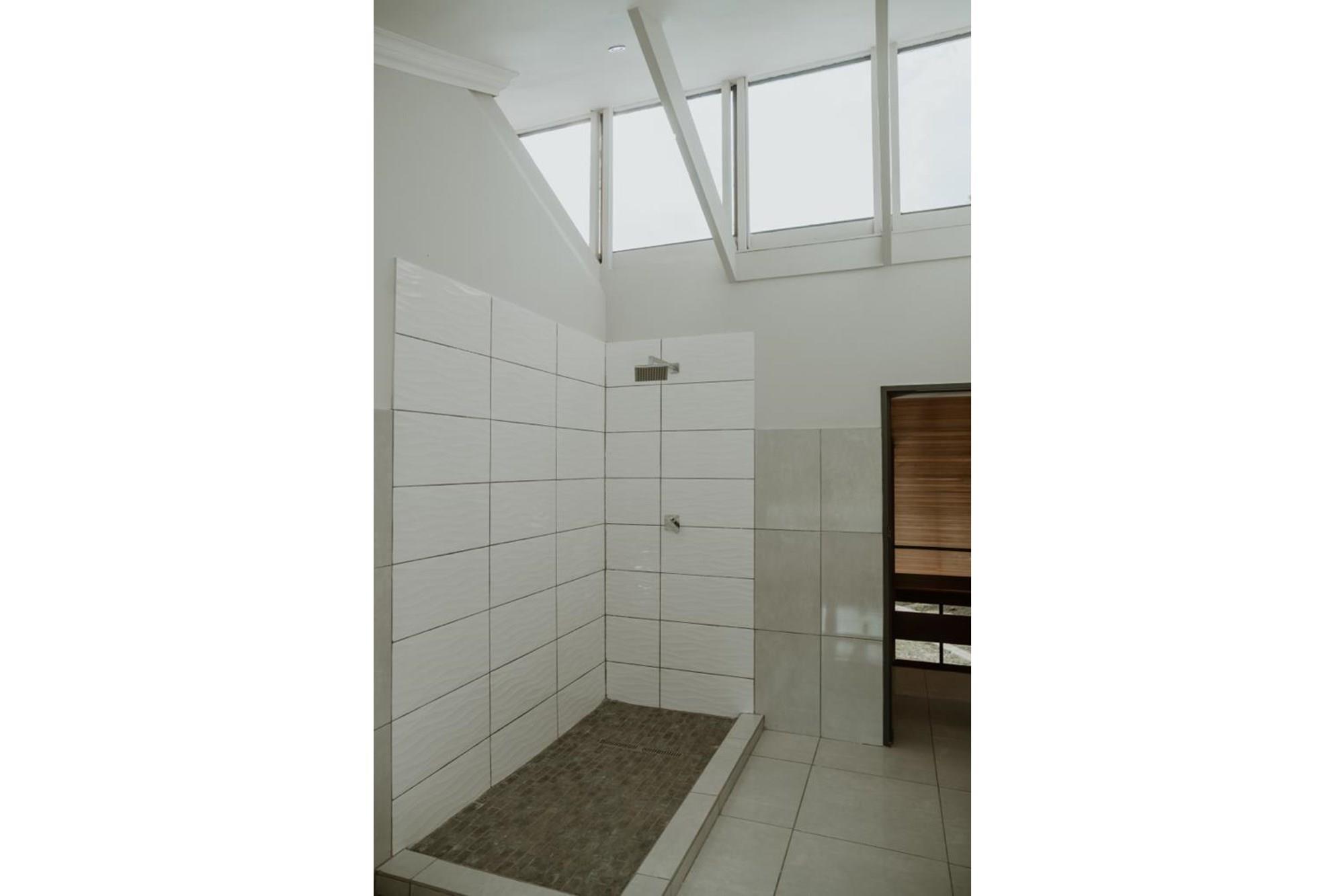 This elegant renovated house boasts 5 bedrooms and 4 bathrooms, including a bachelor flat.