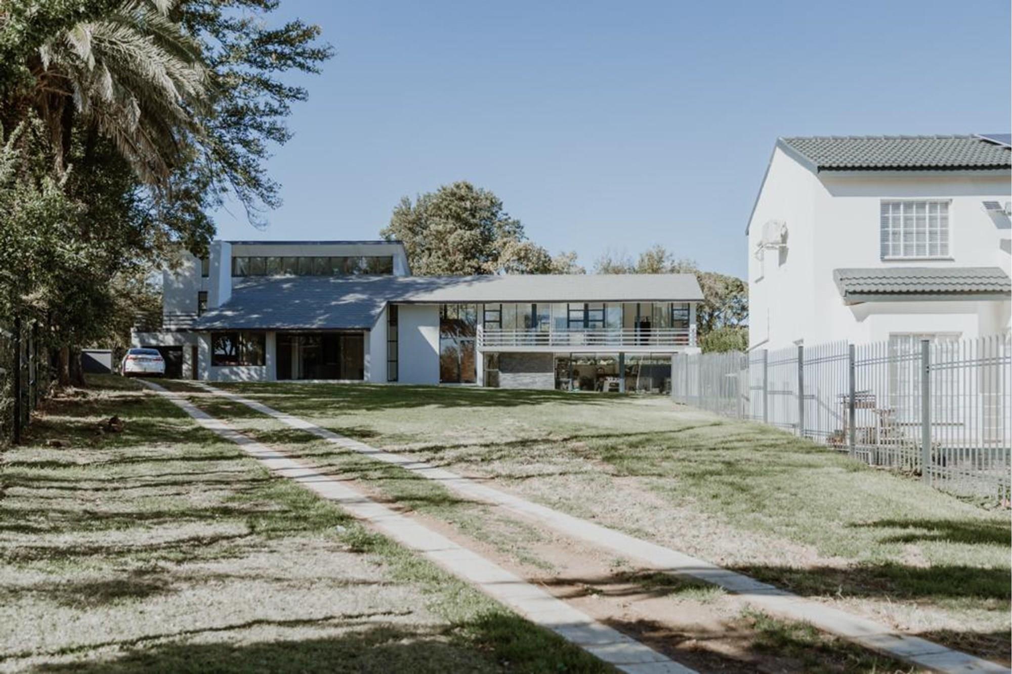 This elegant renovated house boasts 5 bedrooms and 4 bathrooms, including a bachelor flat.