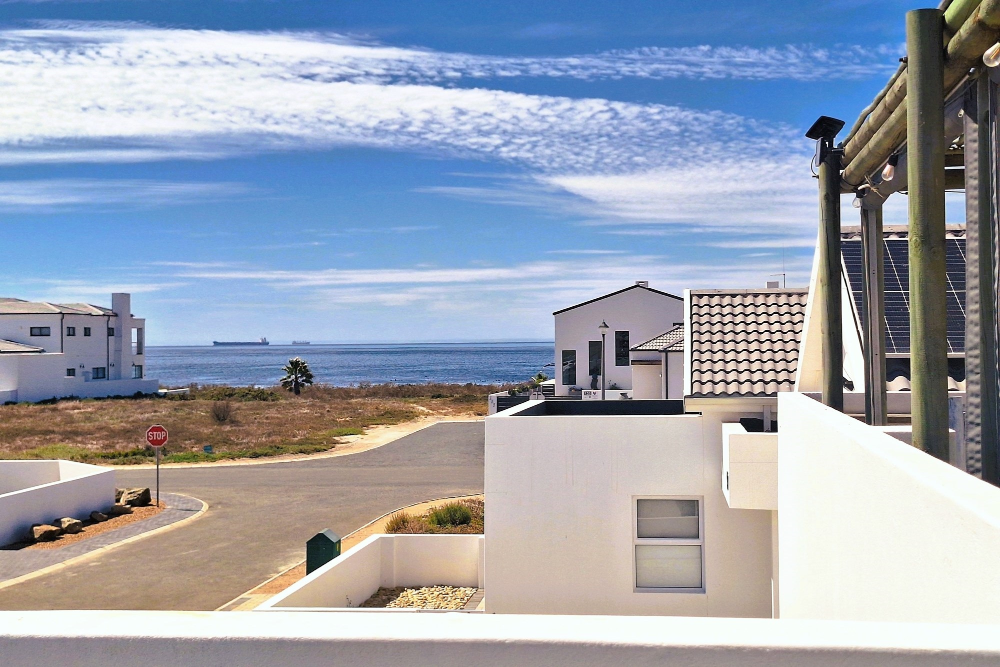 Estate Living at its finest: Stylish, Secure, Serene with partial Ocean Views.