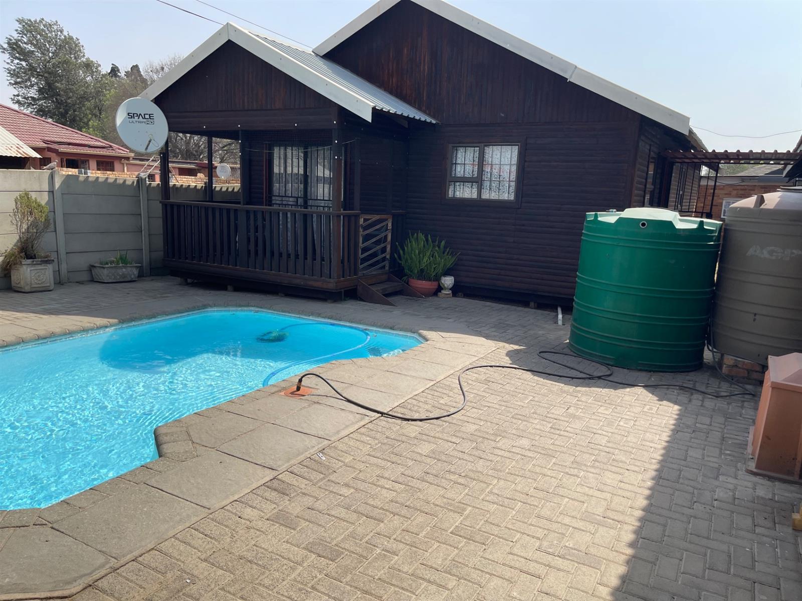 Two Houses in one Yard
