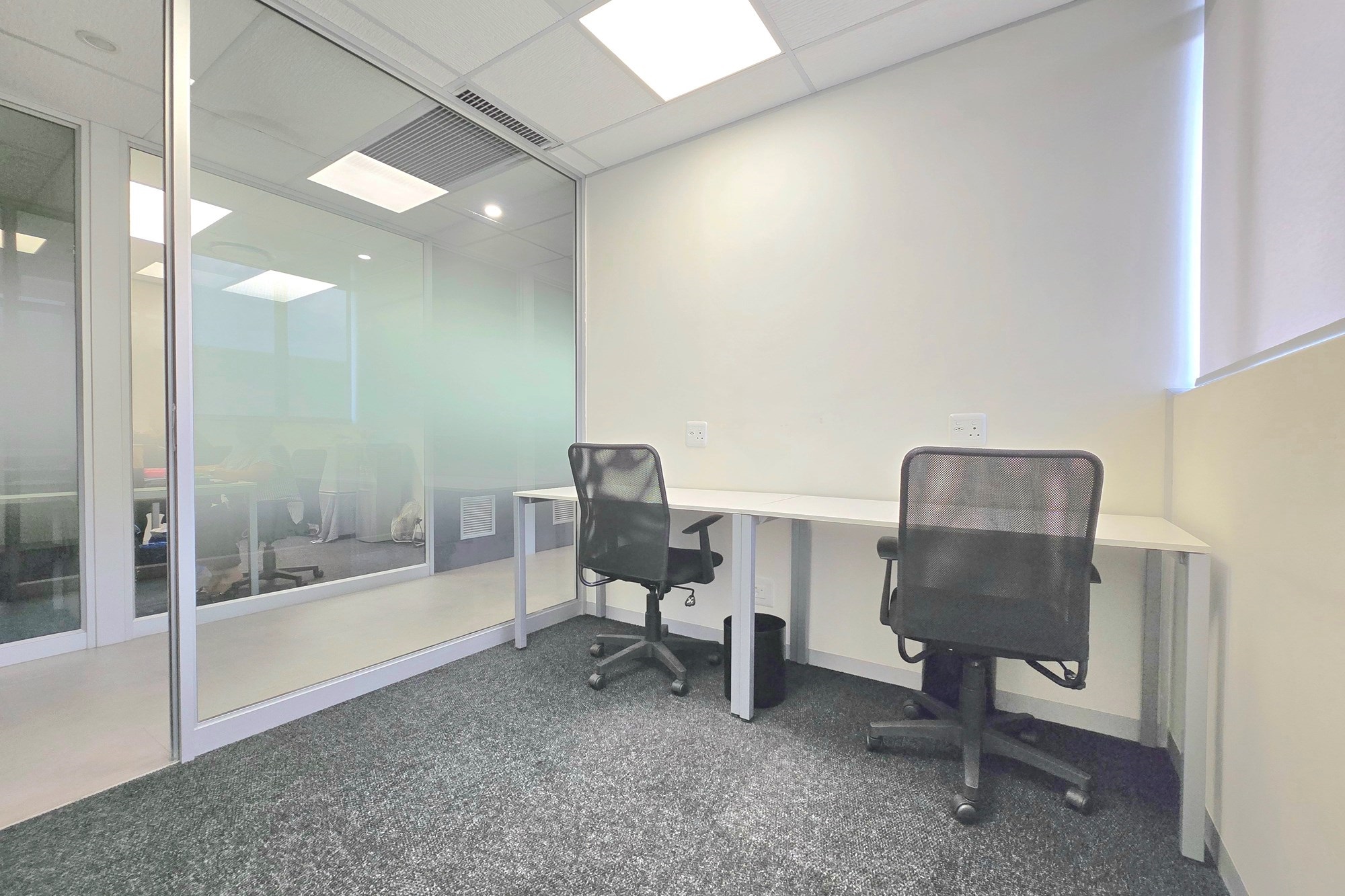 Elevate your workspace with this modern 2-person office