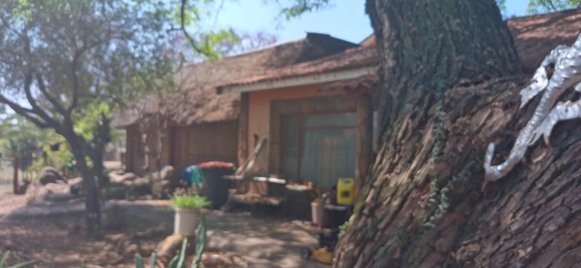 PRICED TO GO FIXER-UPPER WITH GREAT POTENTIAL
