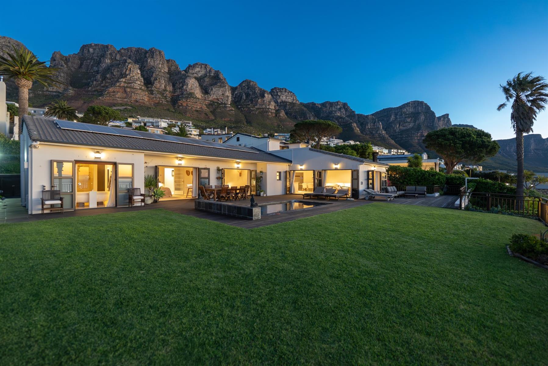 Experience Panoramic Ocean Sunsets from this 6 bedroom, 6 bathroom home