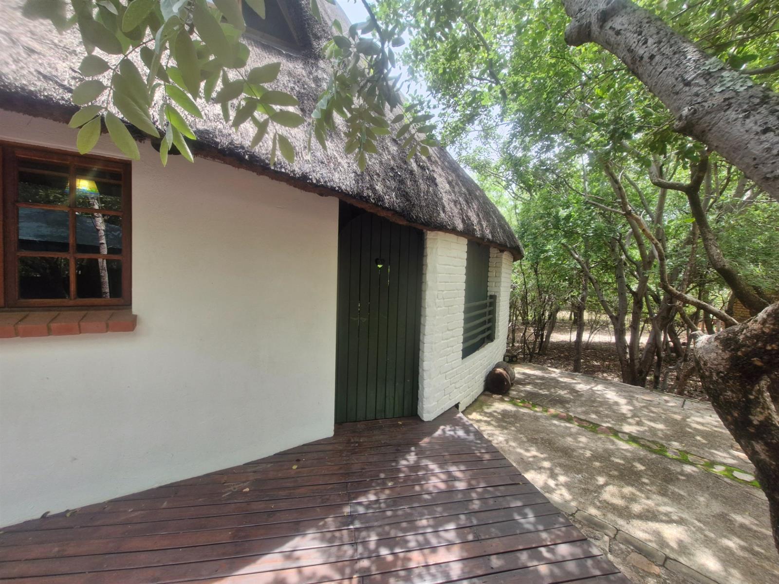 Distinctive Thatch-Home Offering Space