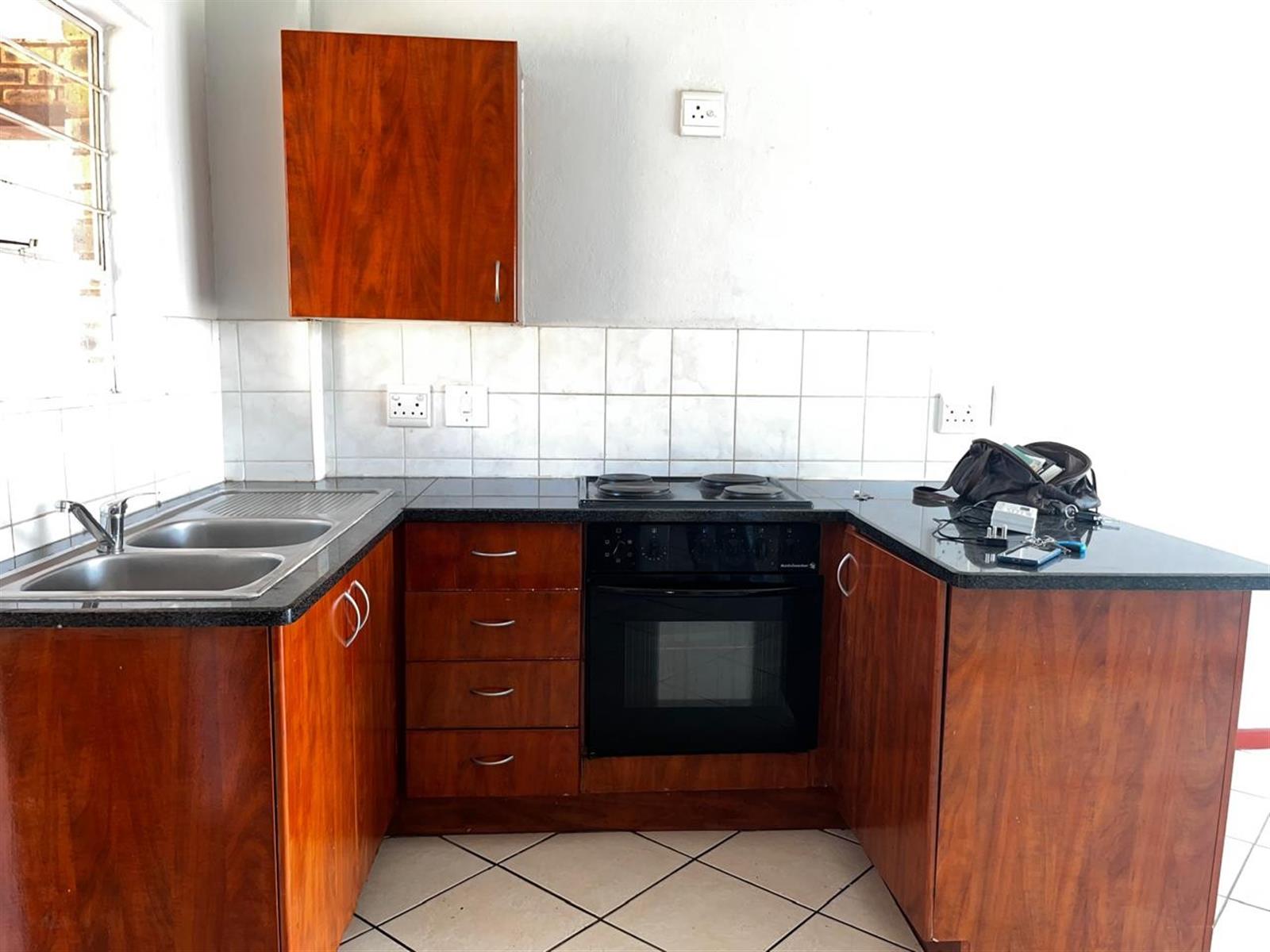 Townhouse For Sale in Honeypark, Roodepoort