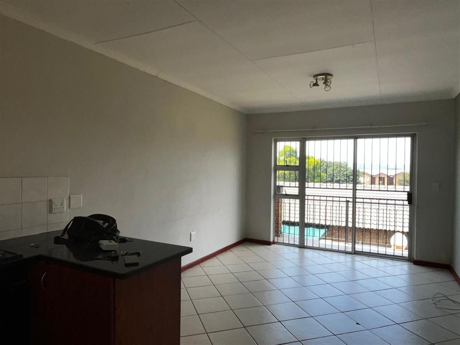 Townhouse For Sale in Honeypark, Roodepoort