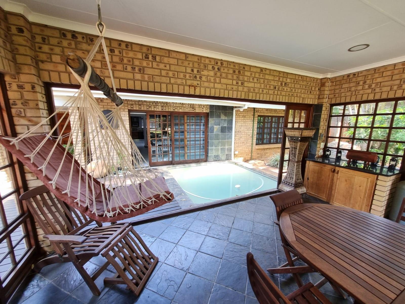 Immaculate Modern Home on Double Stand | Entertainer’s Dream with Pool and Lush Garden