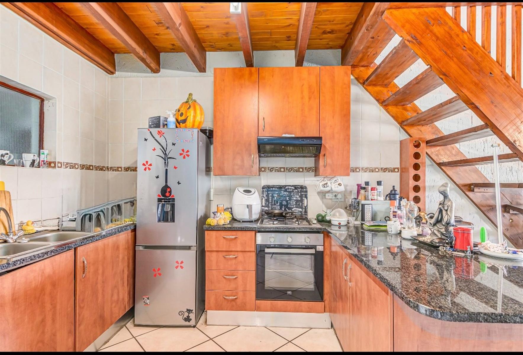 Duplex Apartment For Sale in Paulshof Sandton - 2 bed 2 bath, gas stove, 3 balconies, built-in braai