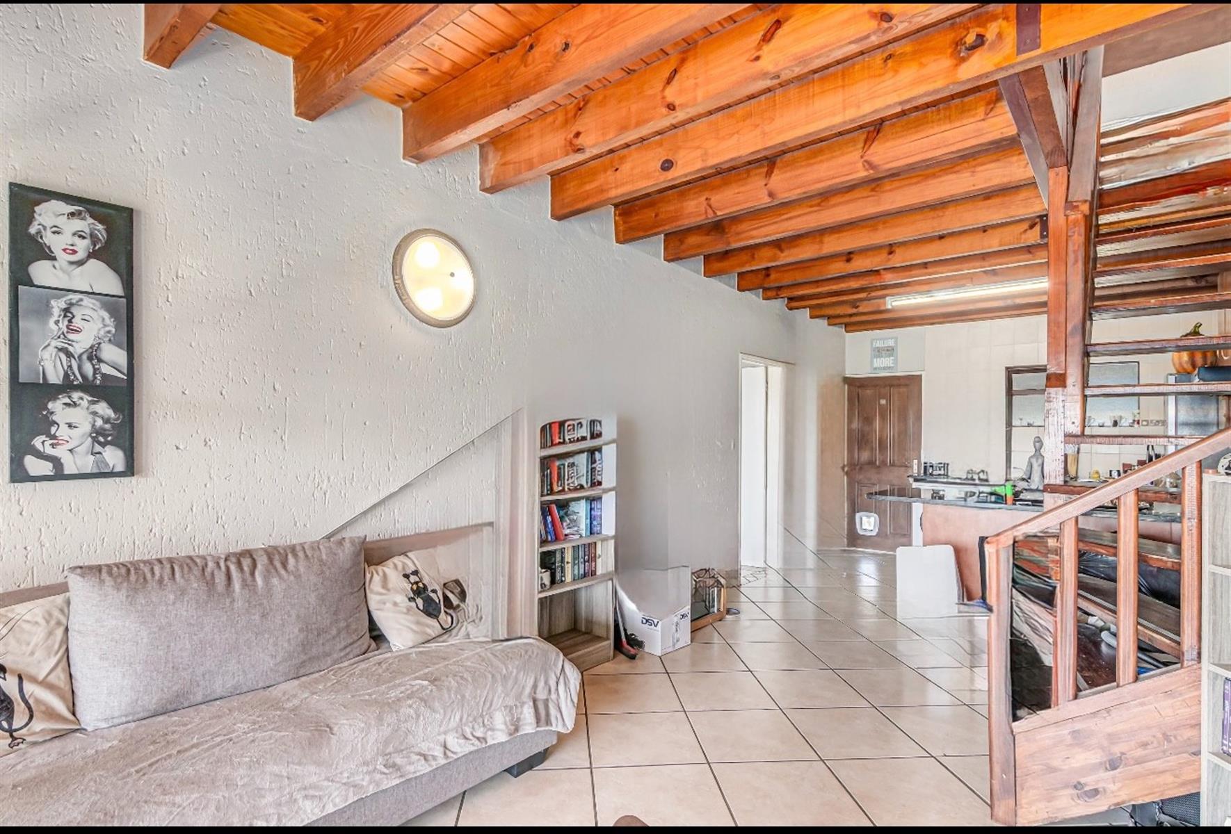 Duplex Apartment For Sale in Paulshof Sandton - 2 bed 2 bath, gas stove, 3 balconies, built-in braai
