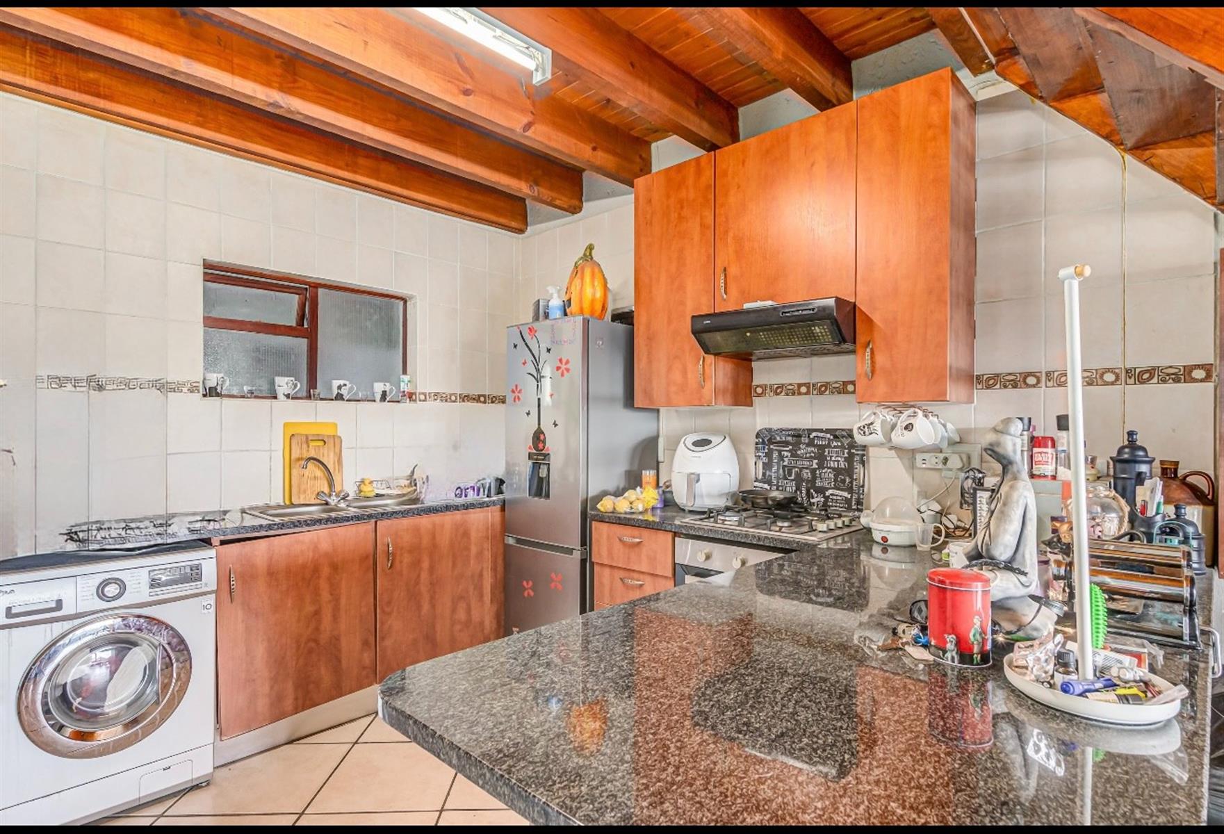 Duplex Apartment For Sale in Paulshof Sandton - 2 bed 2 bath, gas stove, 3 balconies, built-in braai