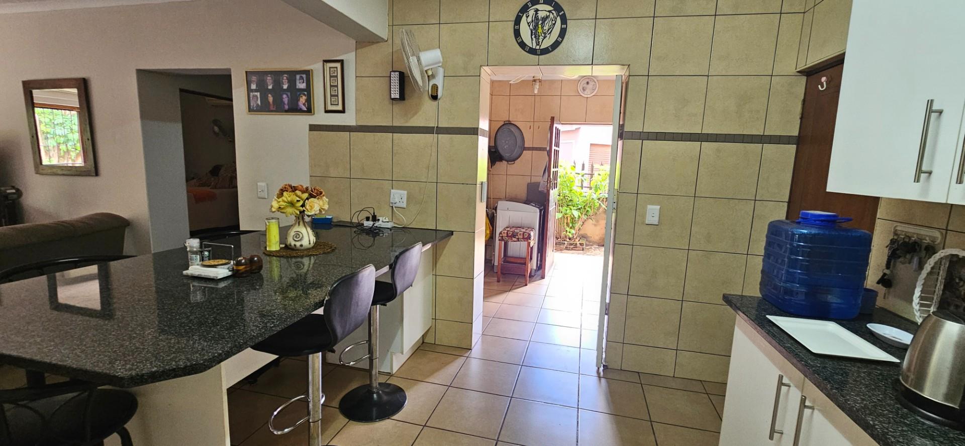 Spacious 4-Bedroom, 3-Bathroom Full Title Home in Semi-Complex