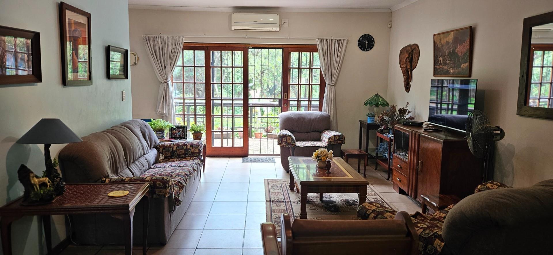 Spacious 4-Bedroom, 3-Bathroom Full Title Home in Semi-Complex