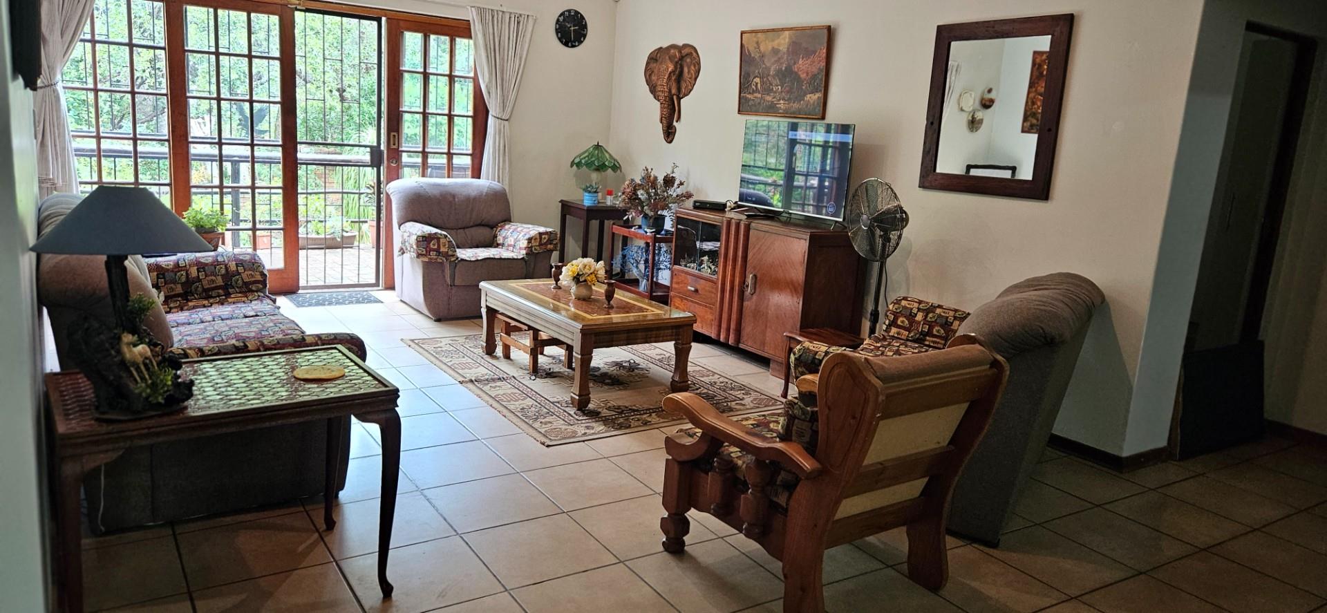 Spacious 4-Bedroom, 3-Bathroom Full Title Home in Semi-Complex