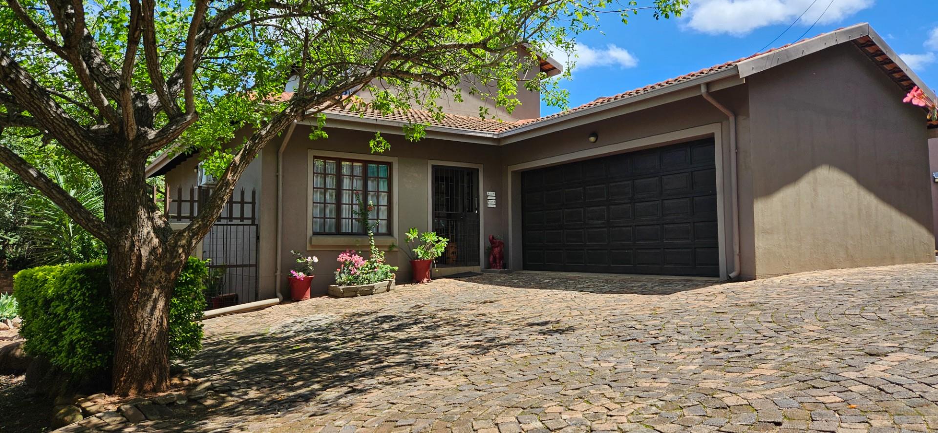 Spacious 4-Bedroom, 3-Bathroom Full Title Home in Semi-Complex