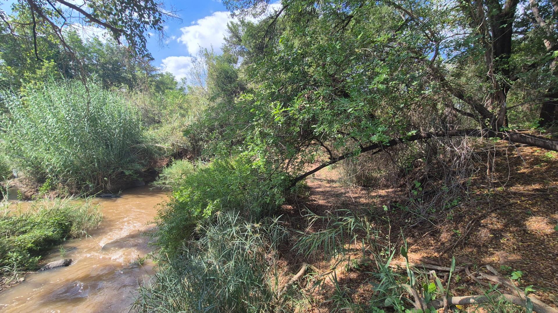 Stunning 14ha plot bordering the Olifants River with 200m river front for sale in Mica, Hoedspruit