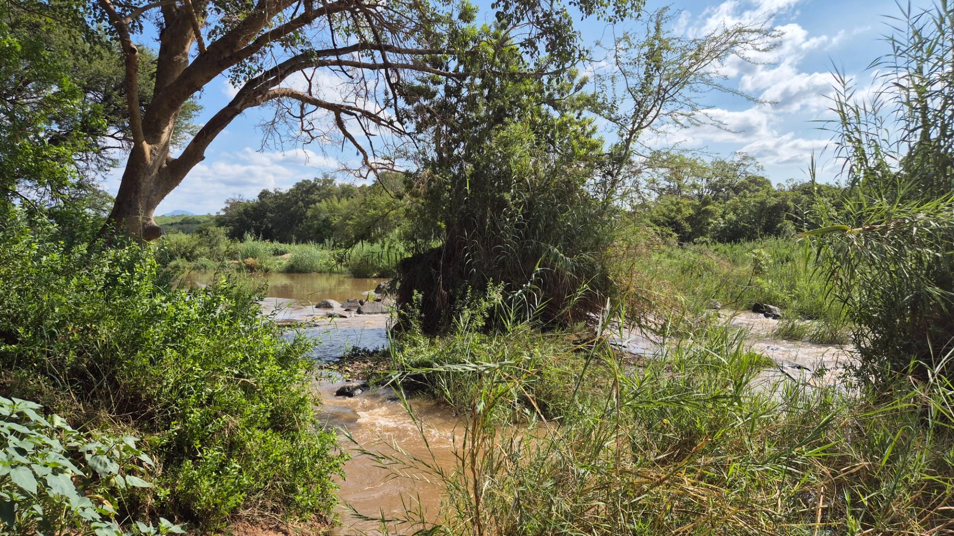 Stunning 14ha plot bordering the Olifants River with 200m river front for sale in Mica, Hoedspruit