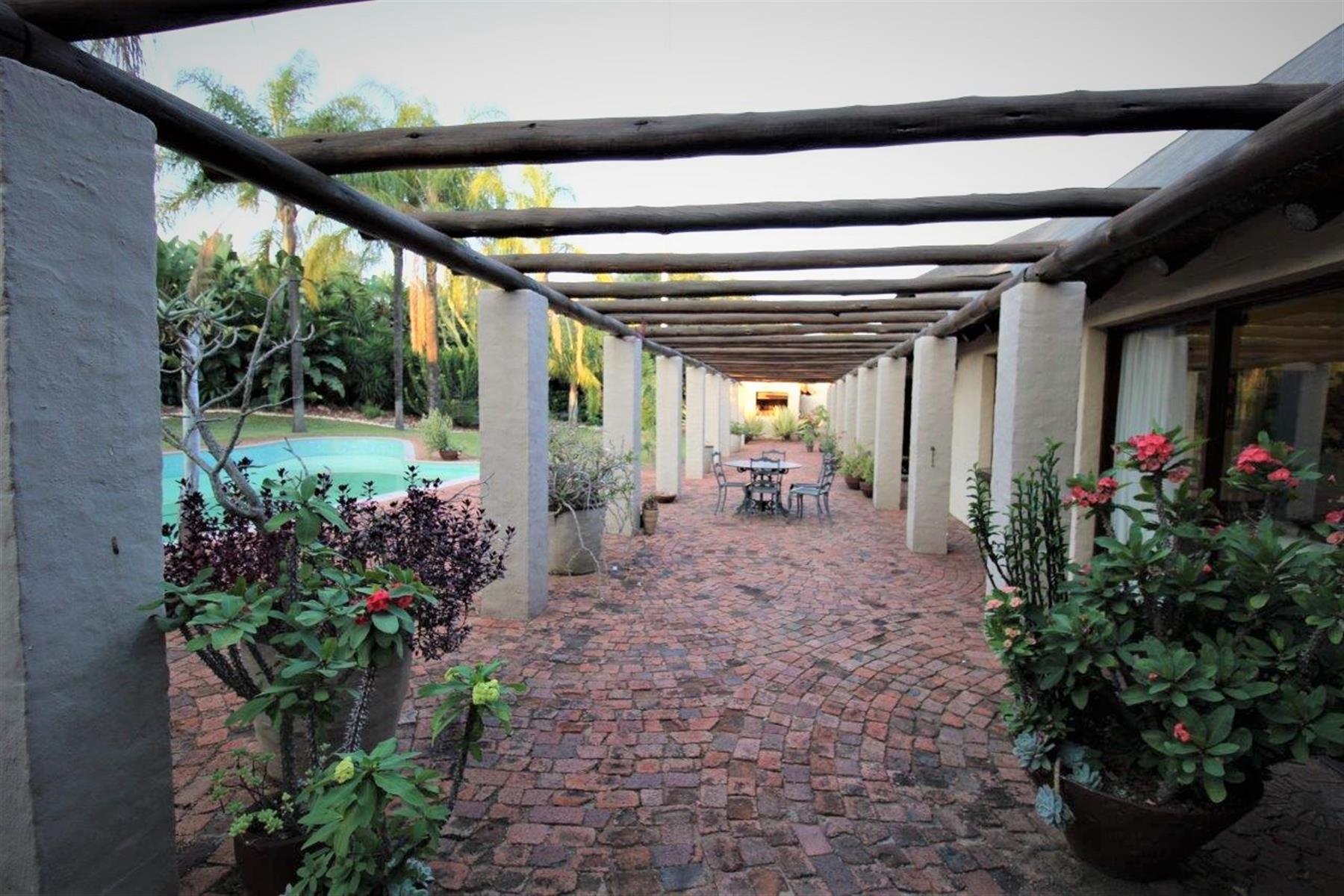 DOUBLE-STOREY THATCH-ROOF HOME IN CENTRAL BELA-BELA- 5 Bedrooms