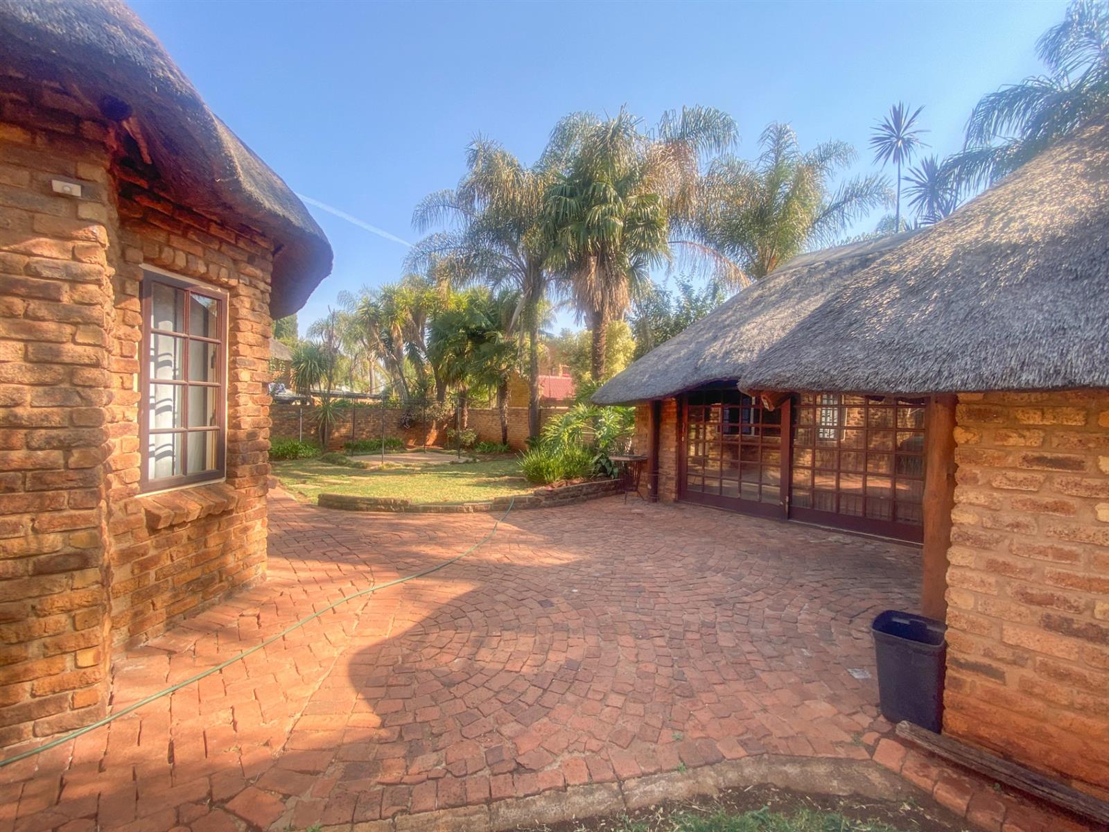 Charming Thatch Roof Family Home in the Heart of Moreletapark