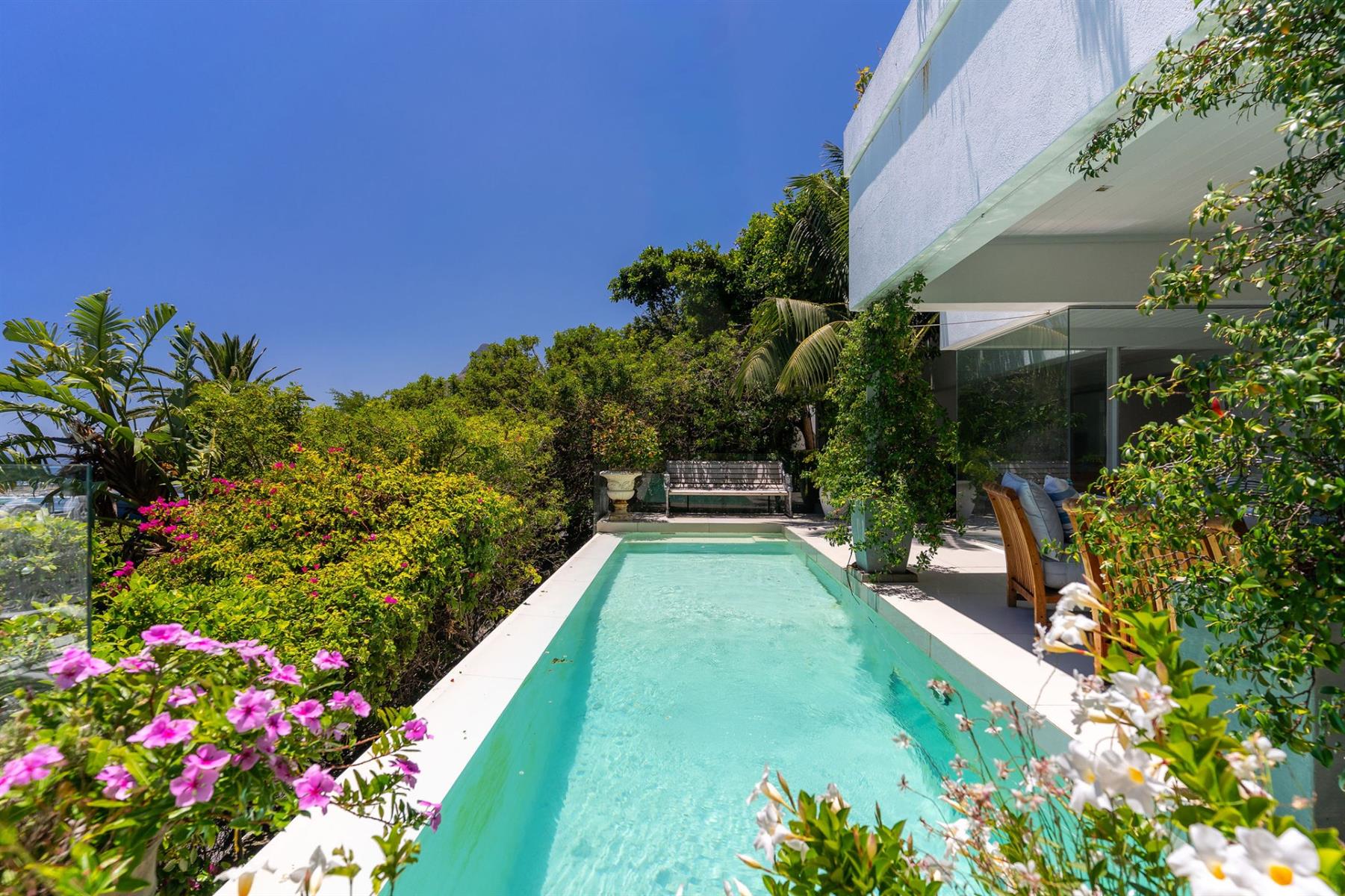 A serene coastal sanctuary perched in one of Camps Bay’s most exclusive elevated positions.