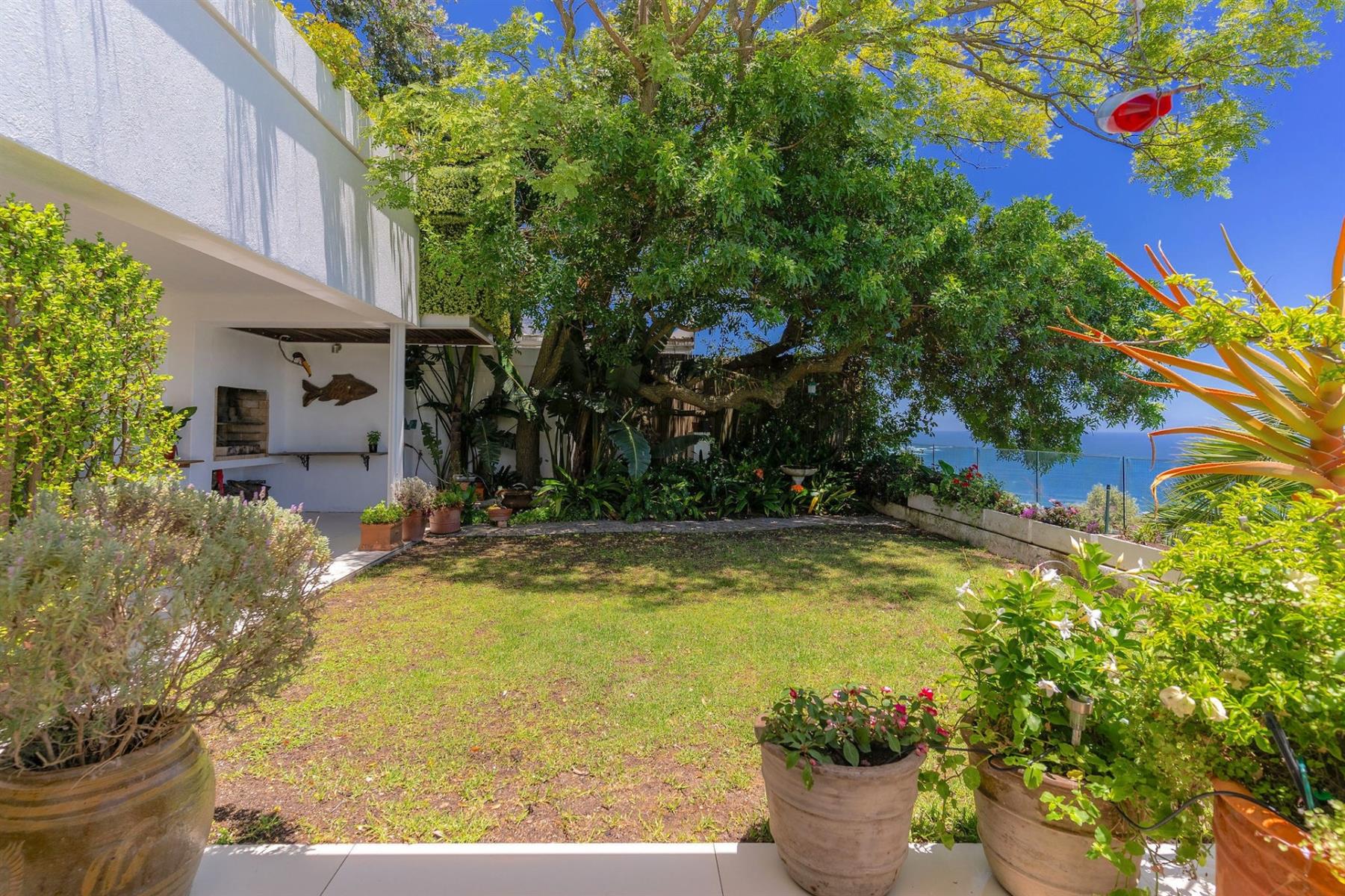 A serene coastal sanctuary perched in one of Camps Bay’s most exclusive elevated positions.