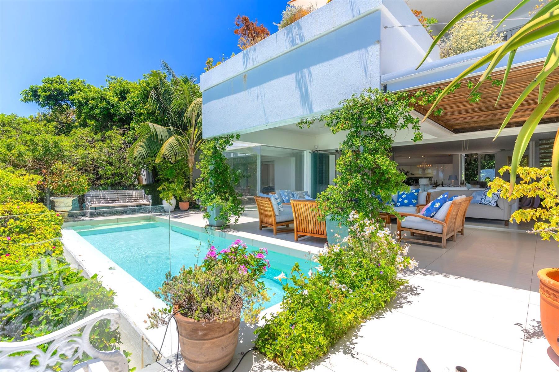 A serene coastal sanctuary perched in one of Camps Bay’s most exclusive elevated positions.