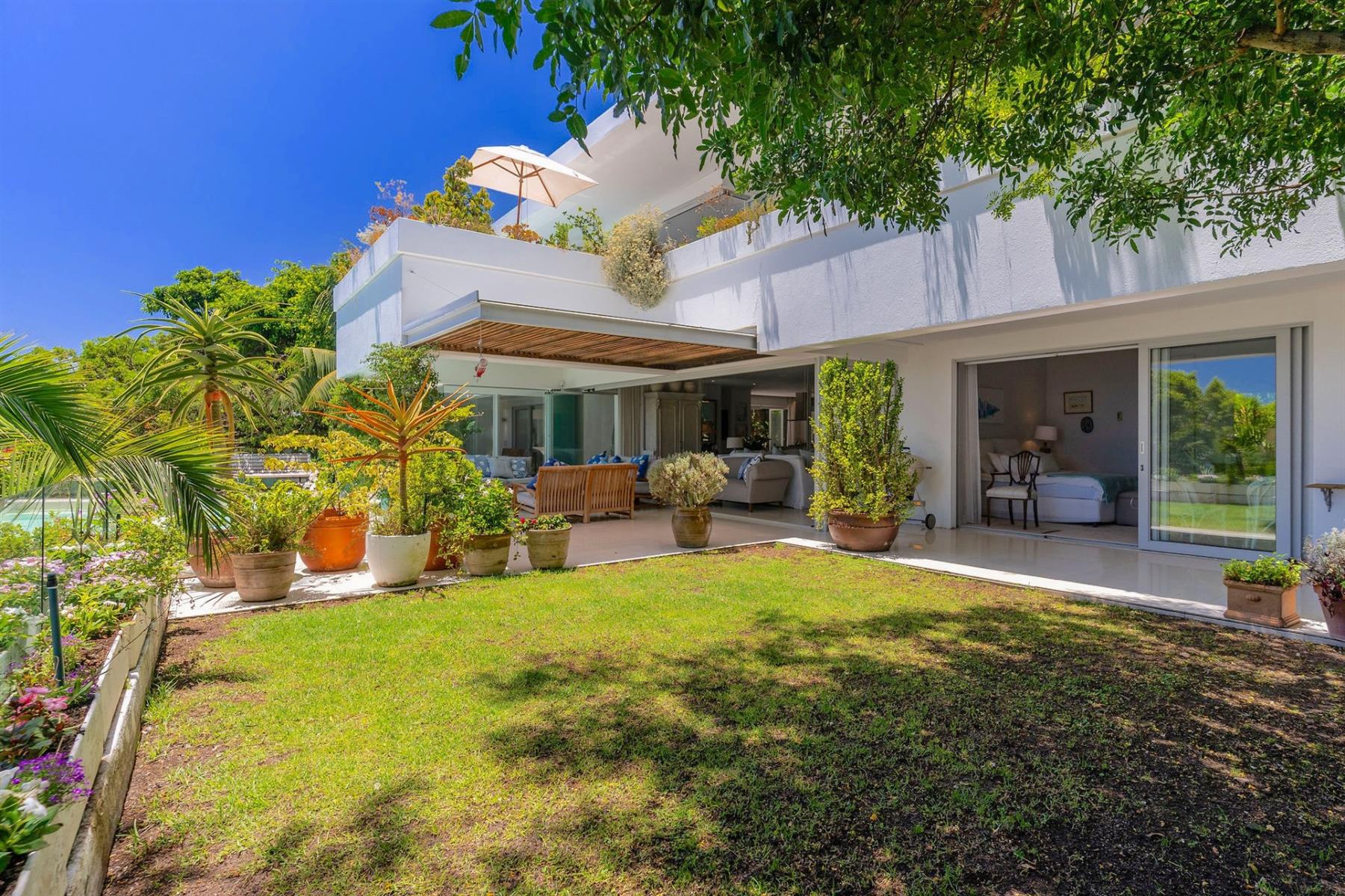 A serene coastal sanctuary perched in one of Camps Bay’s most exclusive elevated positions.