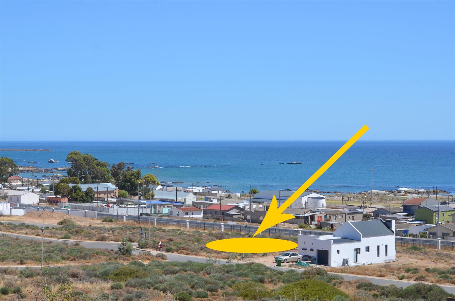 Prime Vacant Land with Design Flexibility in Secure Coastal Village