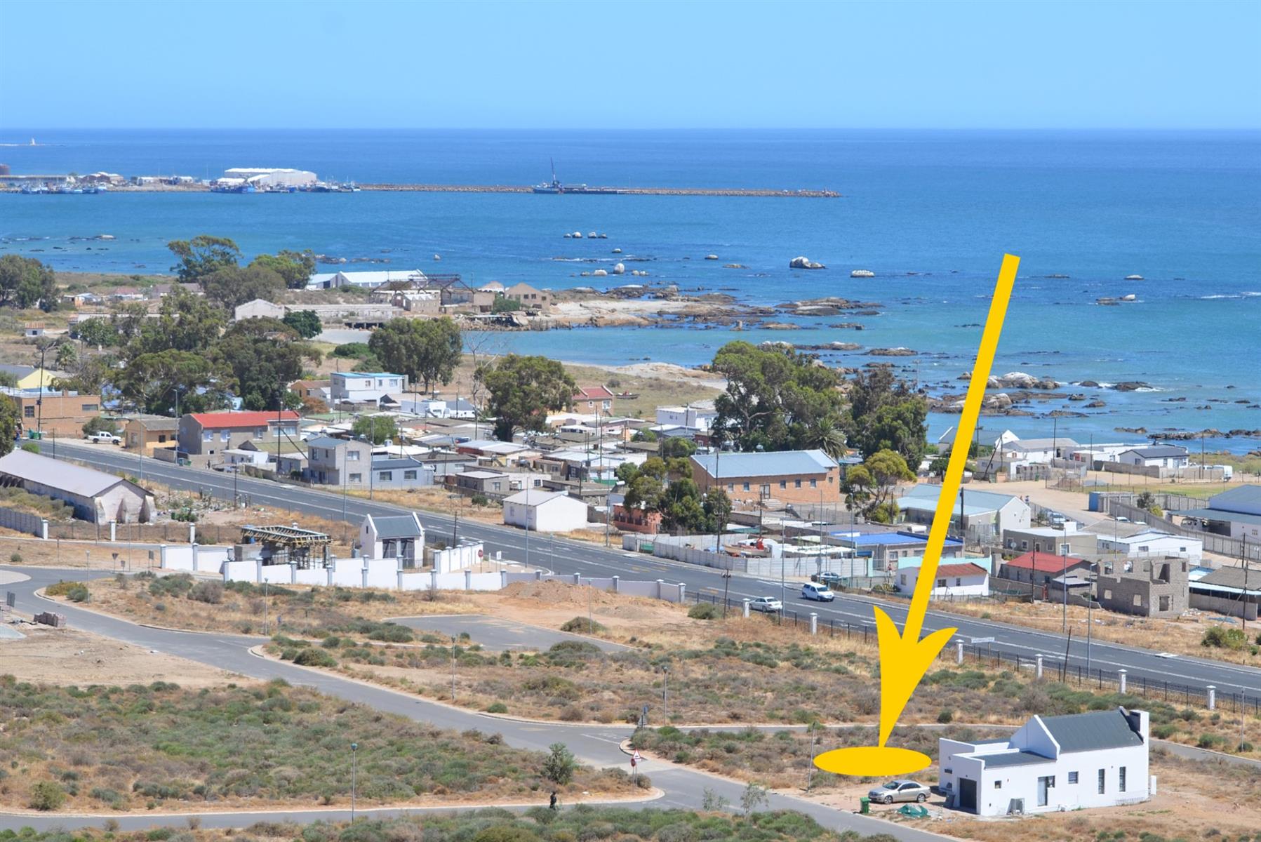 Prime Vacant Land with Design Flexibility in Secure Coastal Village