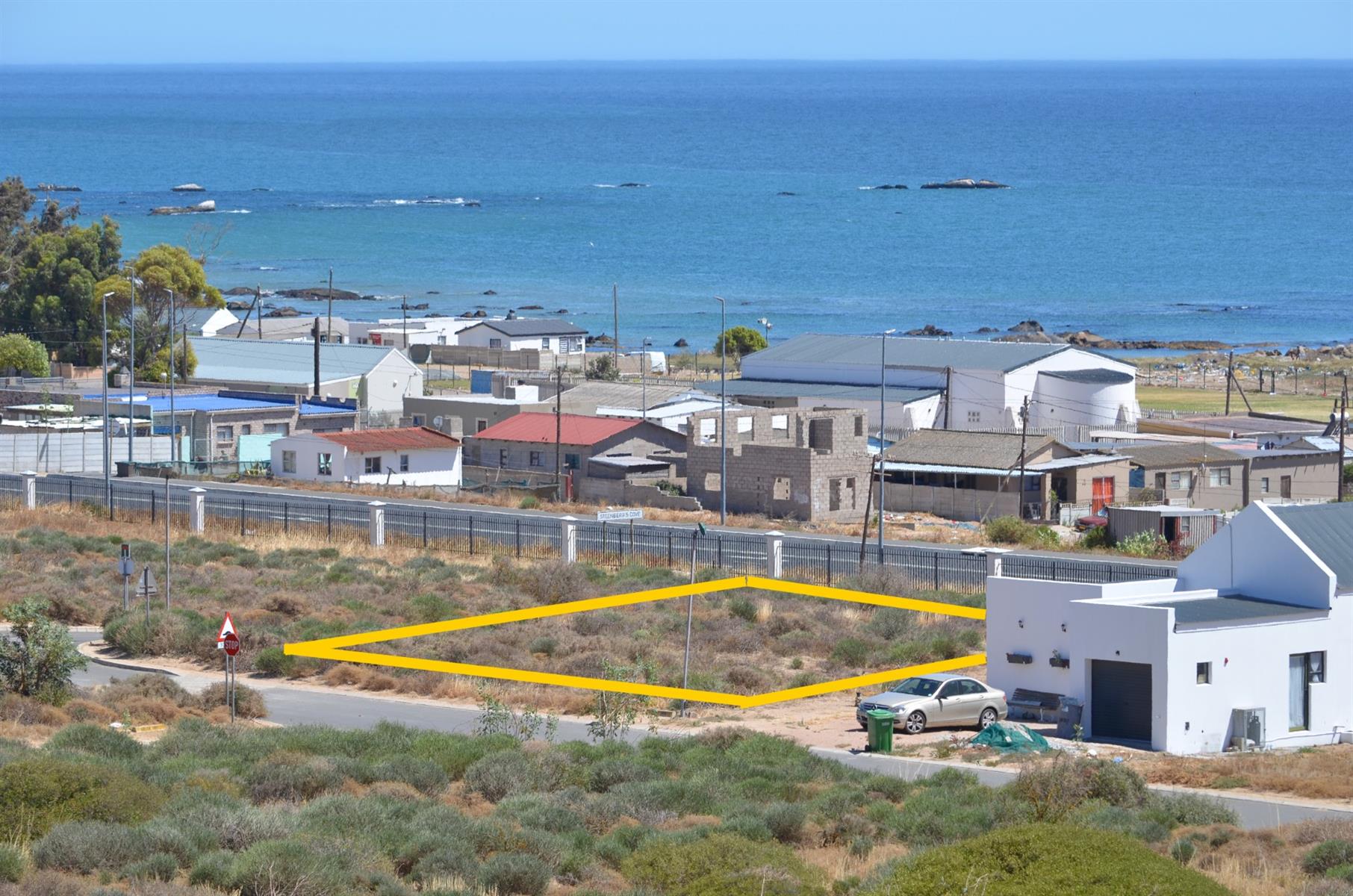 Prime Vacant Land with Design Flexibility in Secure Coastal Village