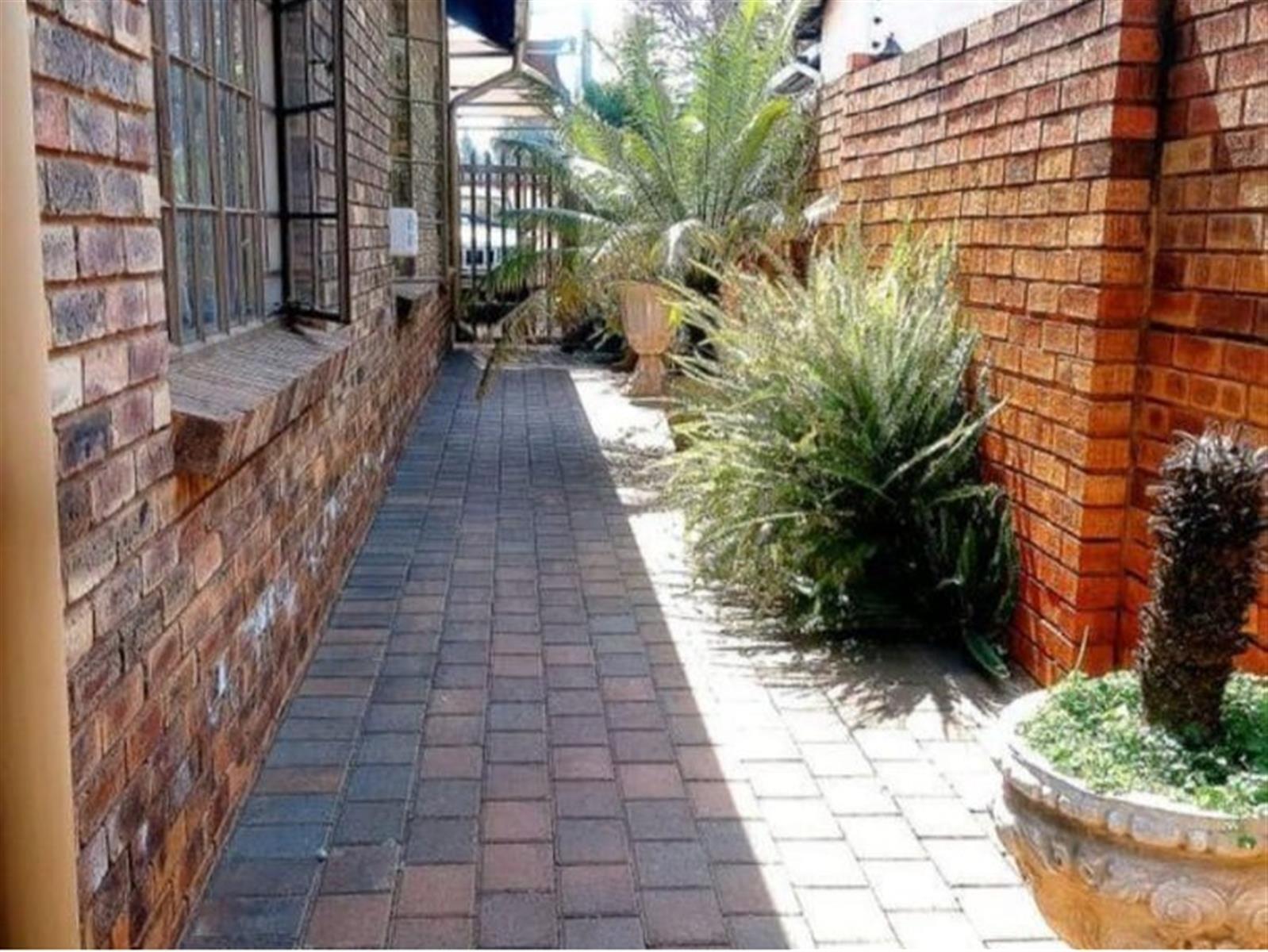 Beautiful spacious 3 bedroom, 2 bathroom, study, entertainment room, garages and carport for sale