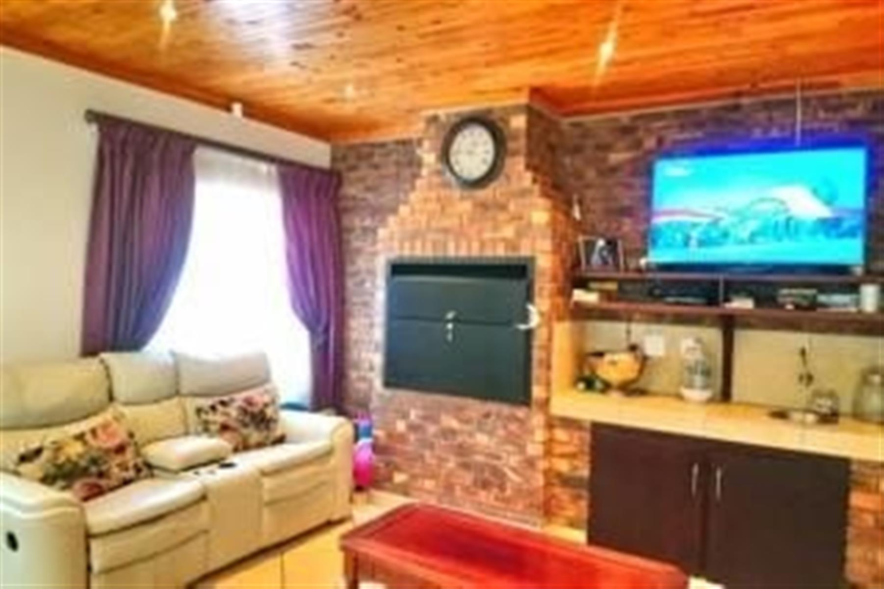 Beautiful spacious 3 bedroom, 2 bathroom, study, entertainment room, garages and carport for sale