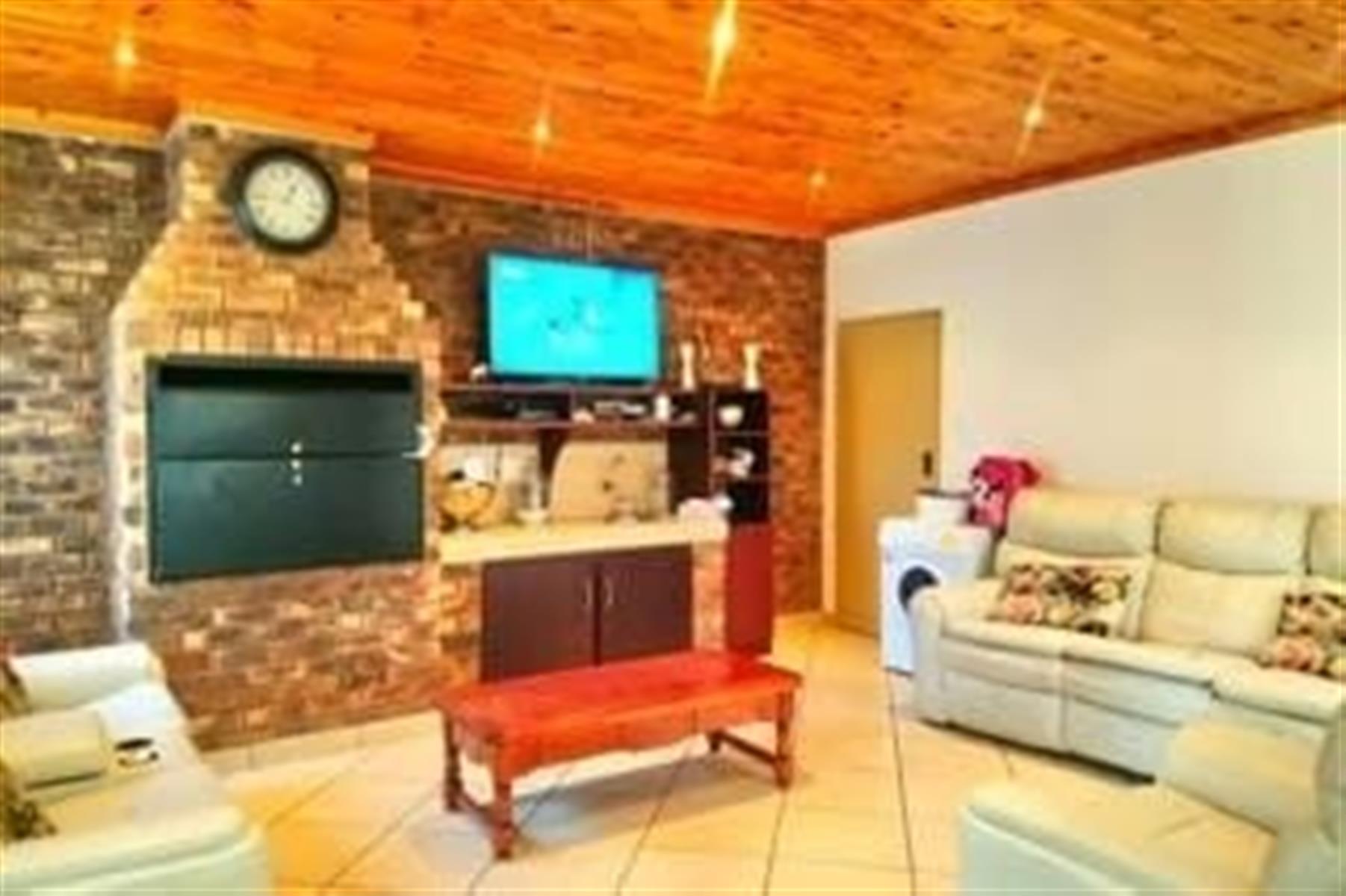Beautiful spacious 3 bedroom, 2 bathroom, study, entertainment room, garages and carport for sale