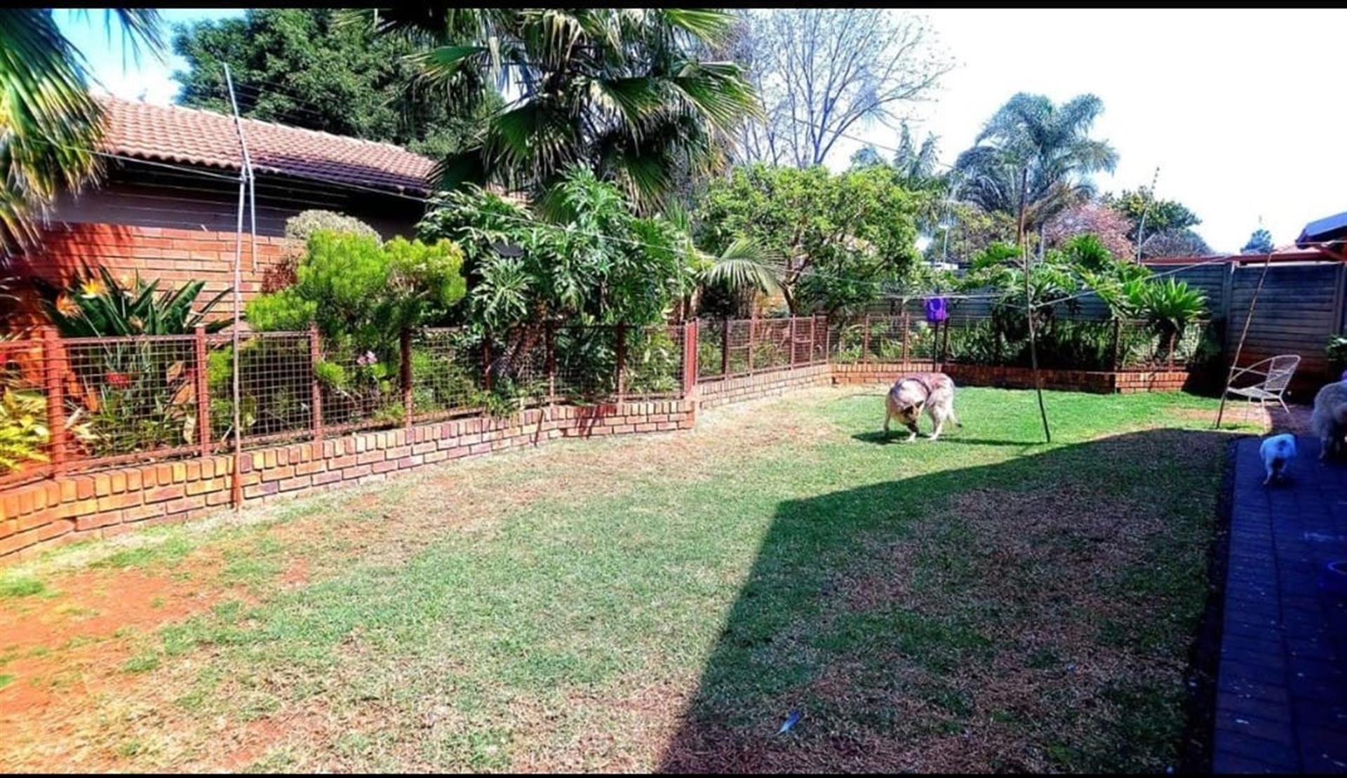 Beautiful spacious 3 bedroom, 2 bathroom, study, entertainment room, garages and carport for sale