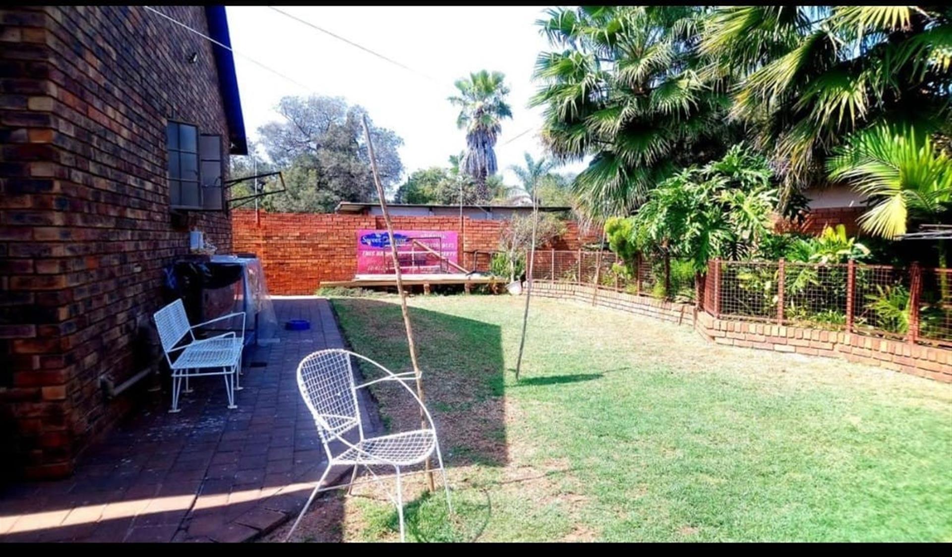 Beautiful spacious 3 bedroom, 2 bathroom, study, entertainment room, garages and carport for sale