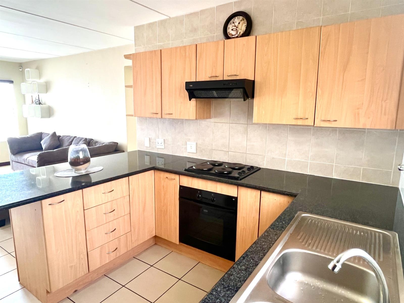 Investment Opportunity: Secure, Move-In-Ready, Spacious 2 Bed, 1 Bath, Open Plan Kitchen Apartment