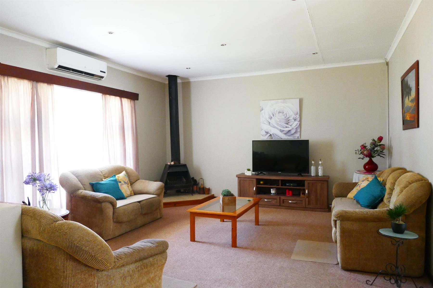 Immaculate Village Home Offering Privacy, Space and Easy Living