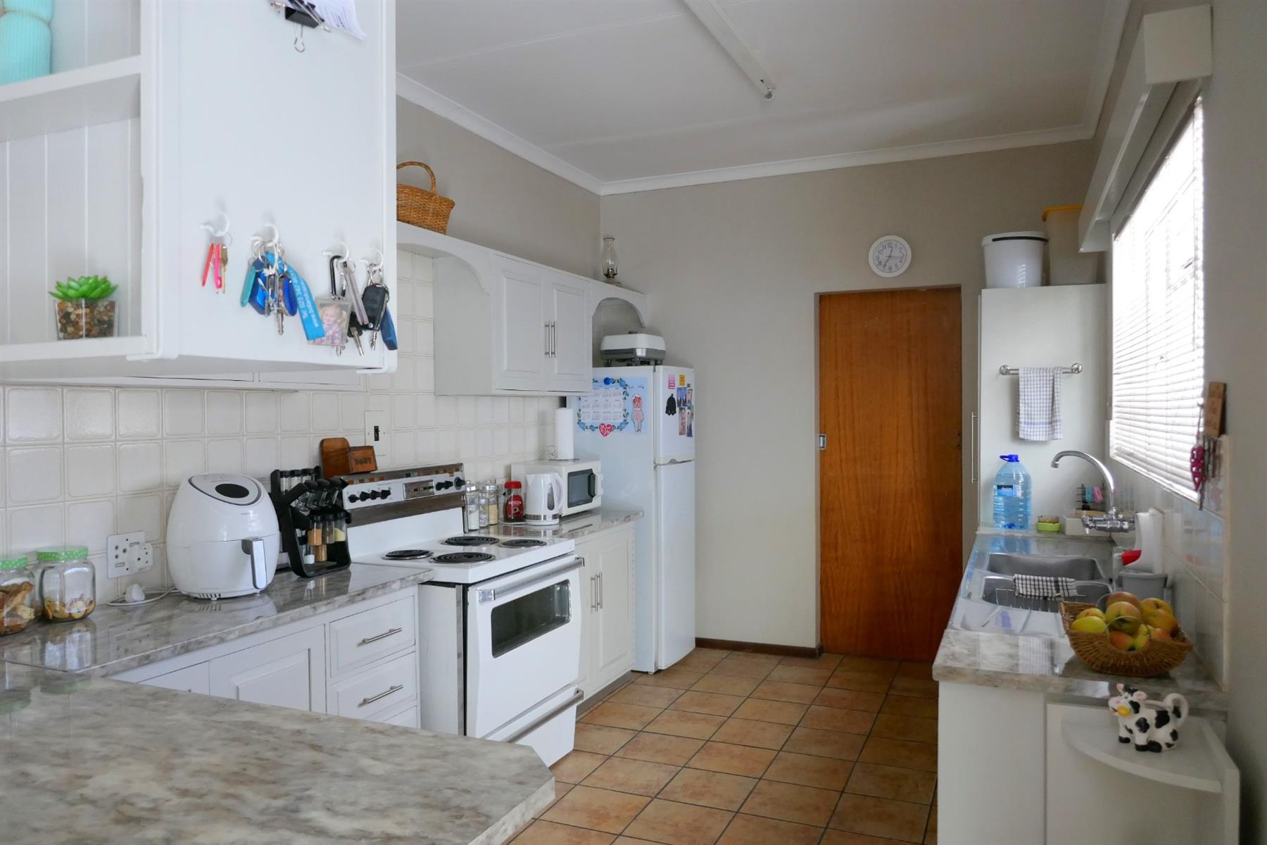 Immaculate Village Home Offering Privacy, Space and Easy Living