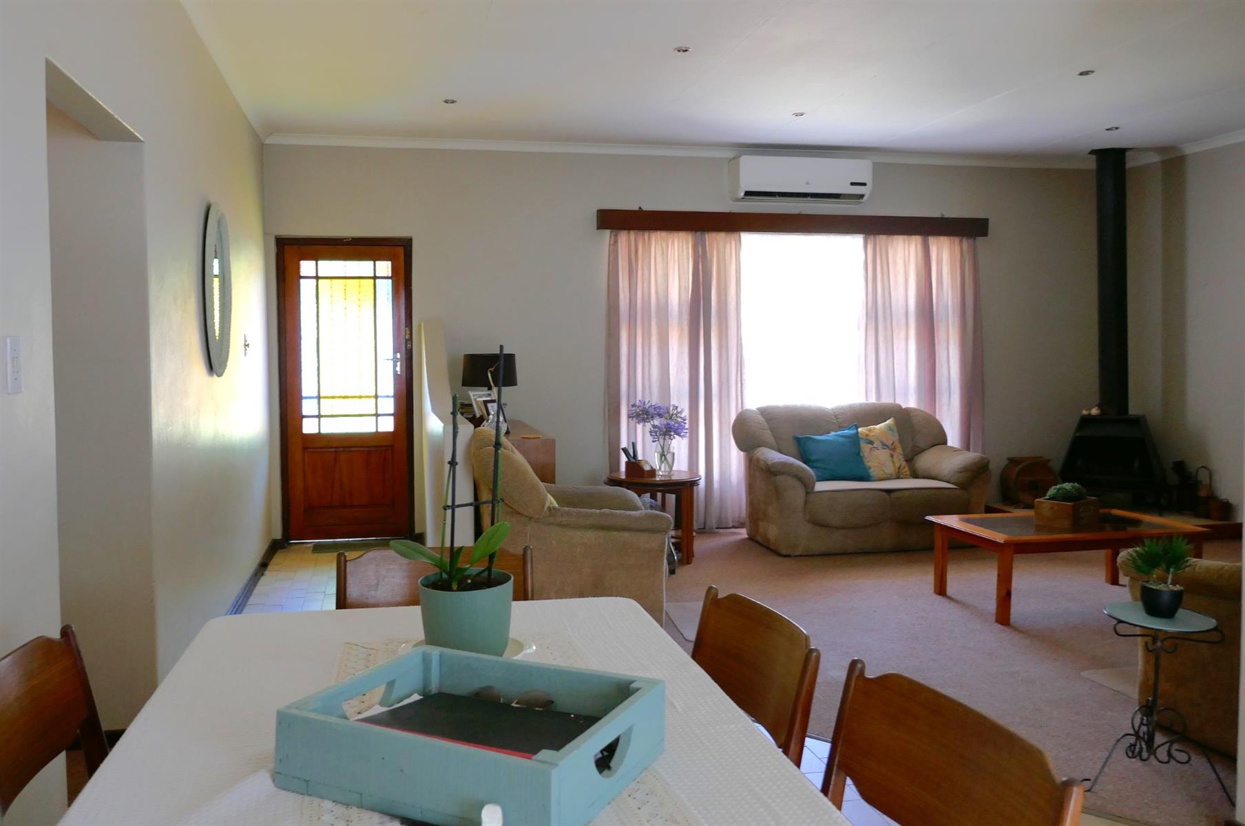 Immaculate Village Home Offering Privacy, Space and Easy Living