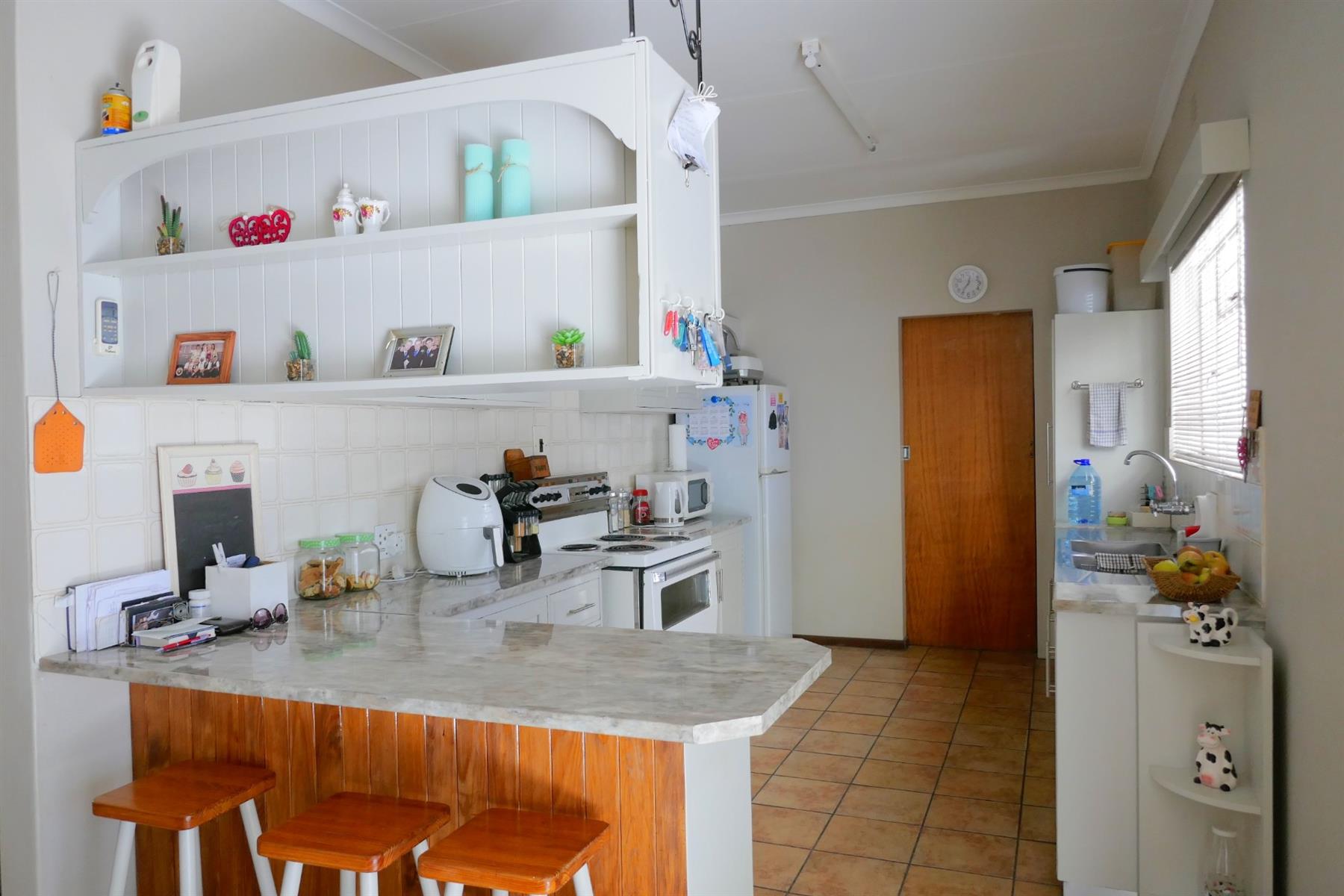 Immaculate Village Home Offering Privacy, Space and Easy Living