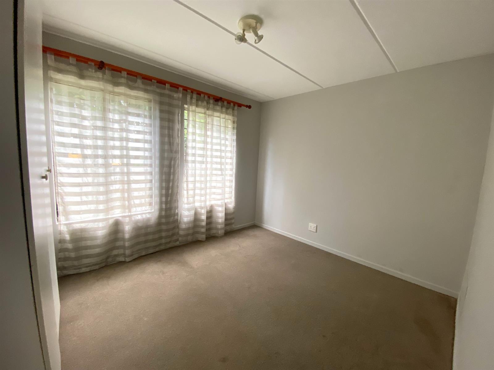 WELL-PRICED GROUND-FLOOR 2-BEDROOM SECTIONAL TITLE UNIT IN FERNDALE