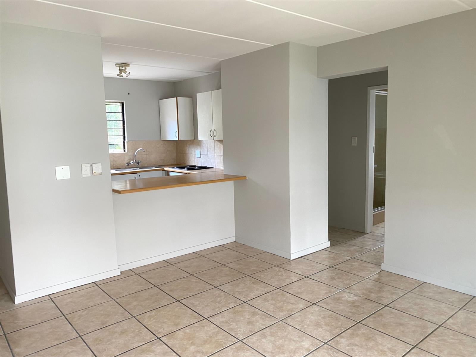 WELL-PRICED GROUND-FLOOR 2-BEDROOM SECTIONAL TITLE UNIT IN FERNDALE