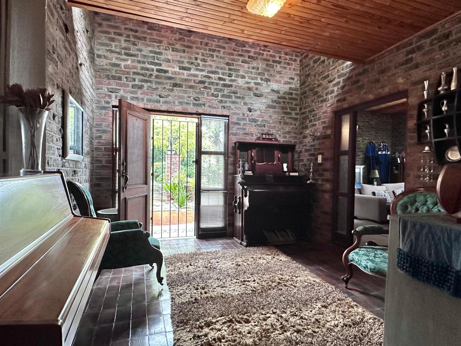 Spacious 5-Bedroom Family Home with Extensive Garaging and Entertainment Area.