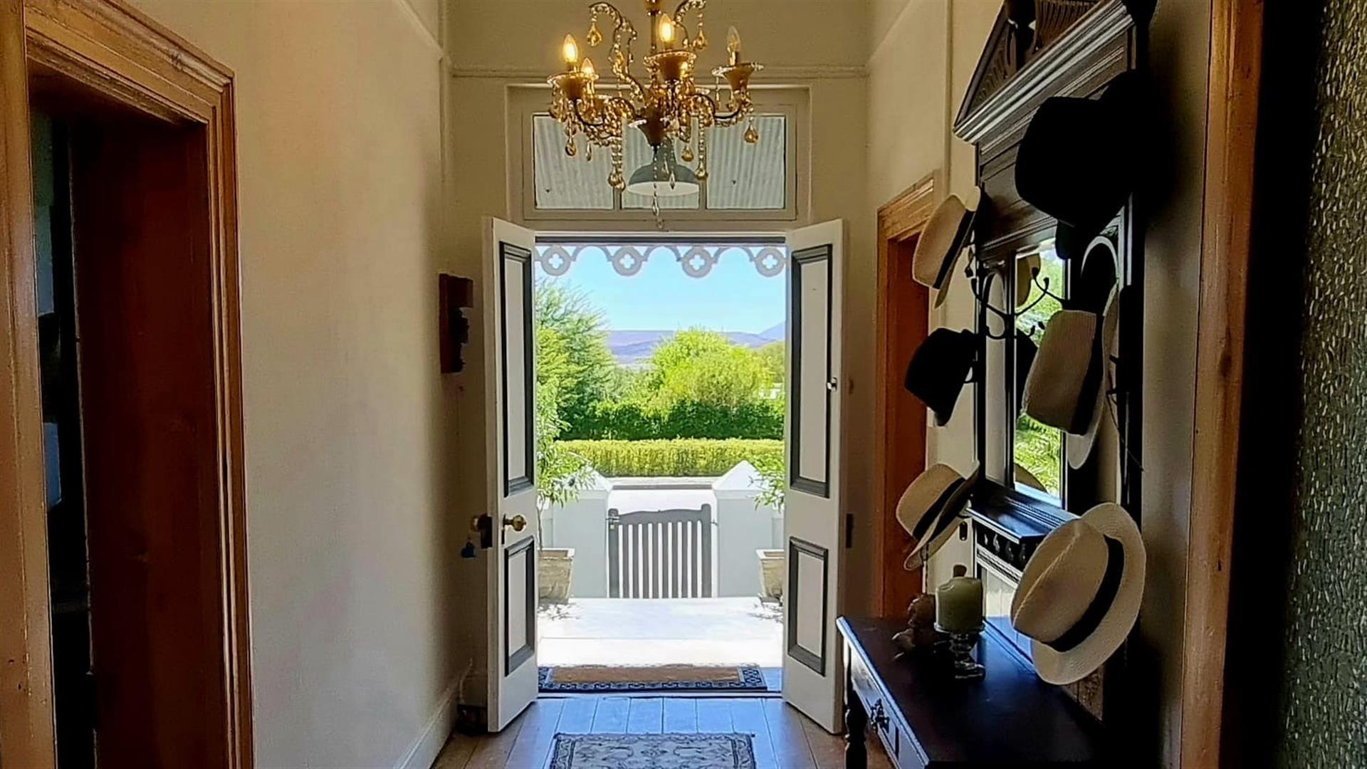 Timeless Victorian Elegance with Lush Gardens and Income-Generating Cottage