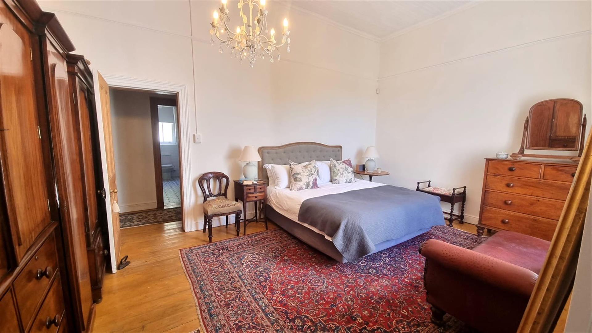 Timeless Victorian Elegance with Lush Gardens and Income-Generating Cottage