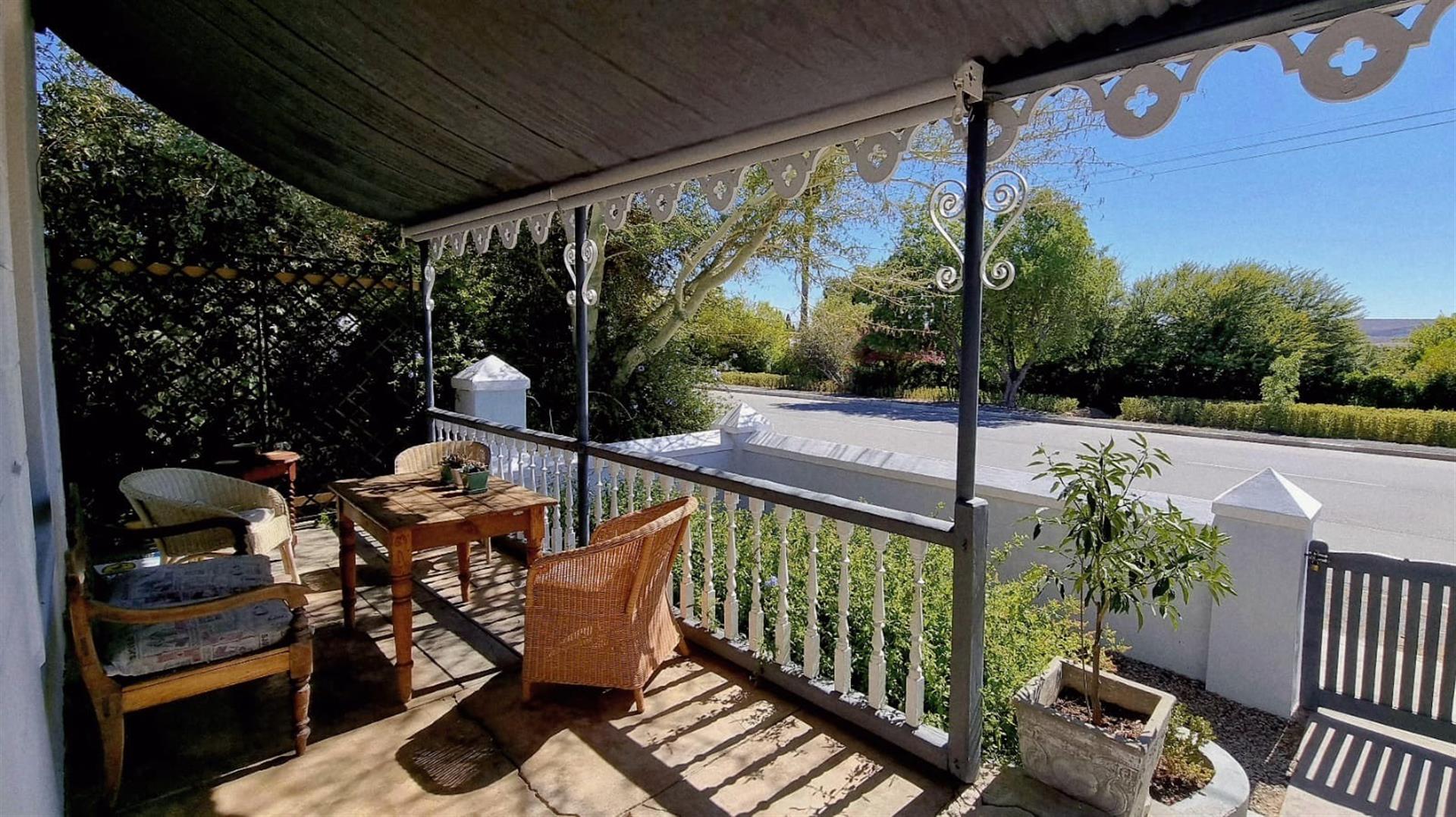 Timeless Victorian Elegance with Lush Gardens and Income-Generating Cottage