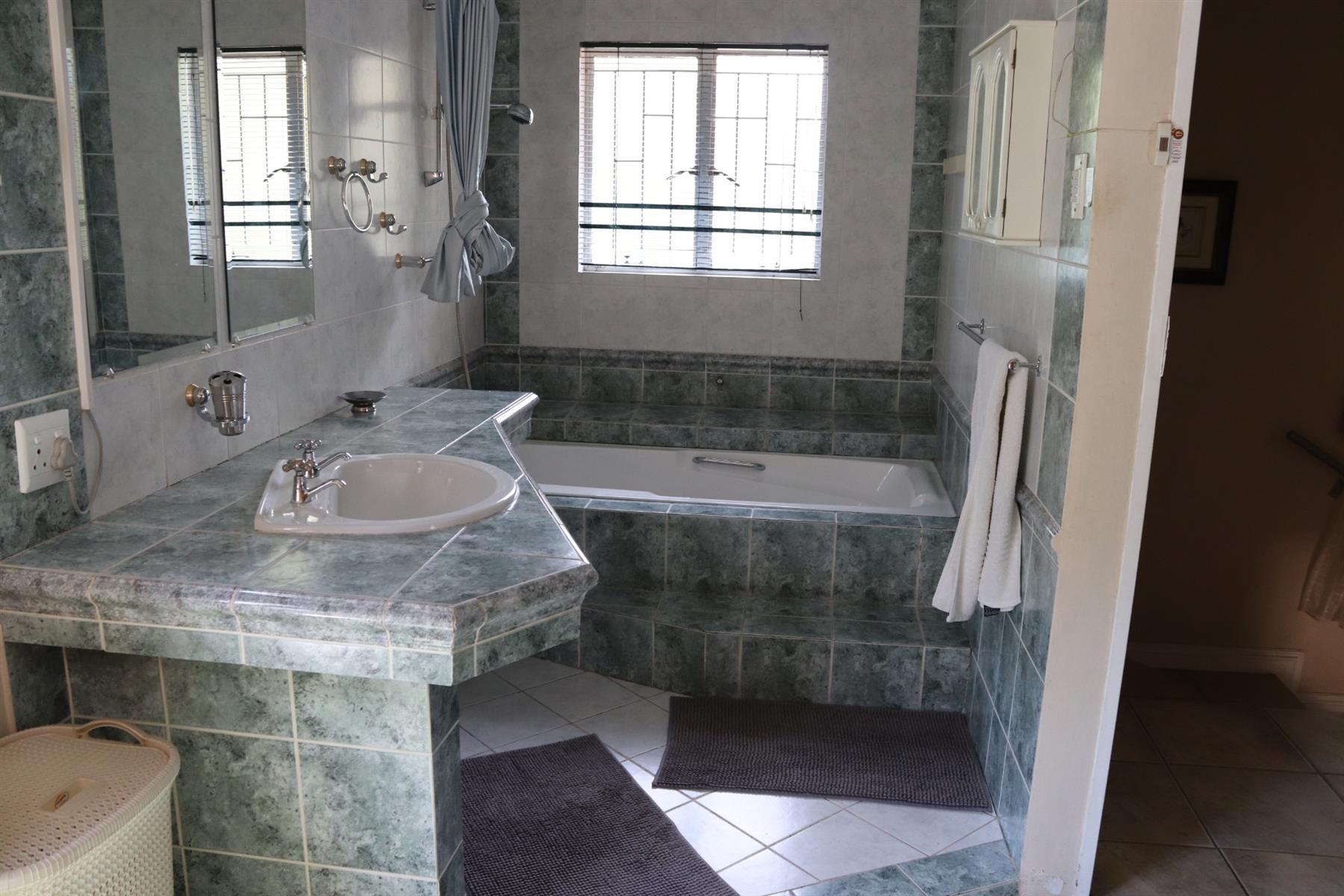 Exceptional 8-Bedroom Residence with Pool, Flatlet, 3 Kitchens in Secunda