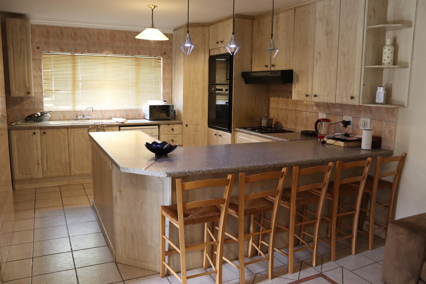 Exceptional 8-Bedroom Residence with Pool, Flatlet, 3 Kitchens in Secunda