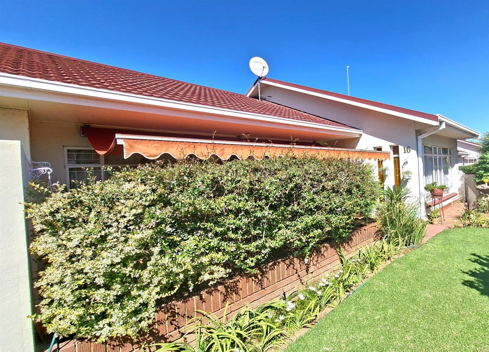 Beautifully Maintained Three-Bedroom Townhouse in a Peaceful Complex Near Schools