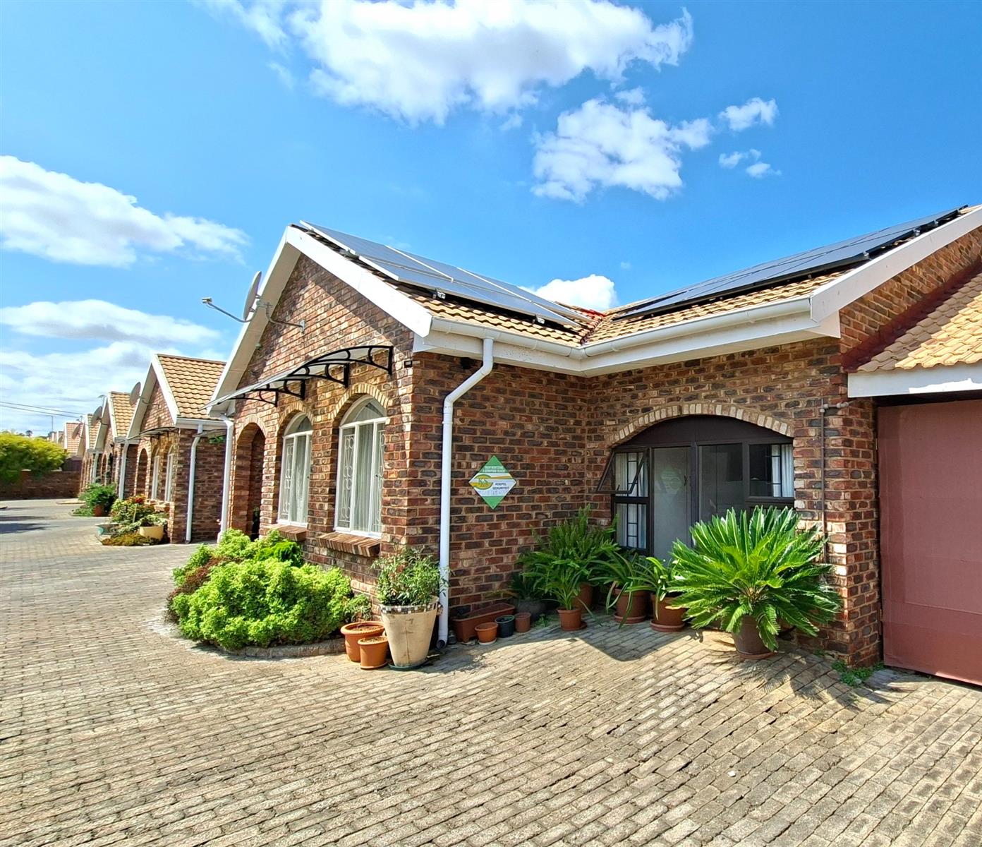 LOW-MAINTENANCE, 2 BEDROOM TOWNHOUSE, FULLY UPGRADED OFF-GRID PROPERTY!
